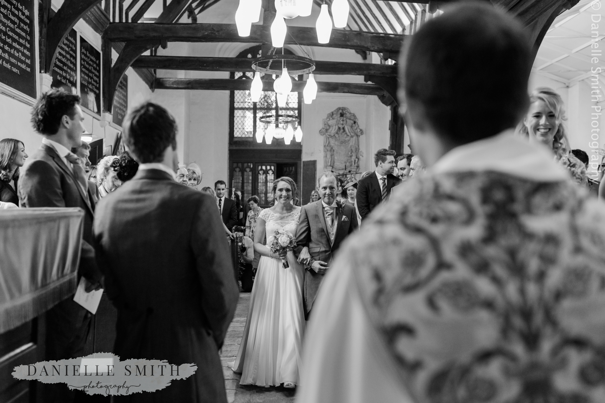bride and her dad waking down aisle