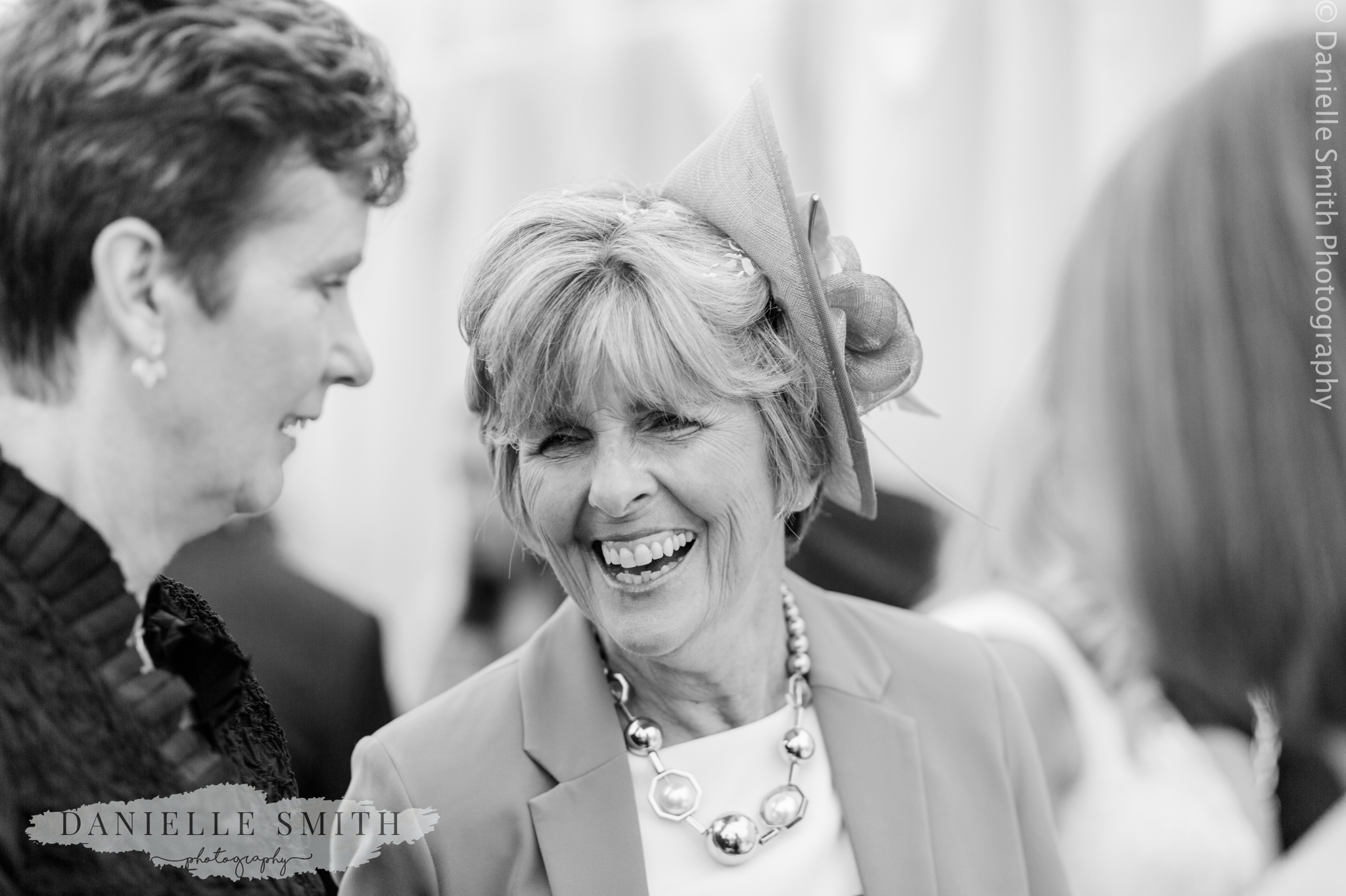 wedding guest laughing - relaxed marquee wedding