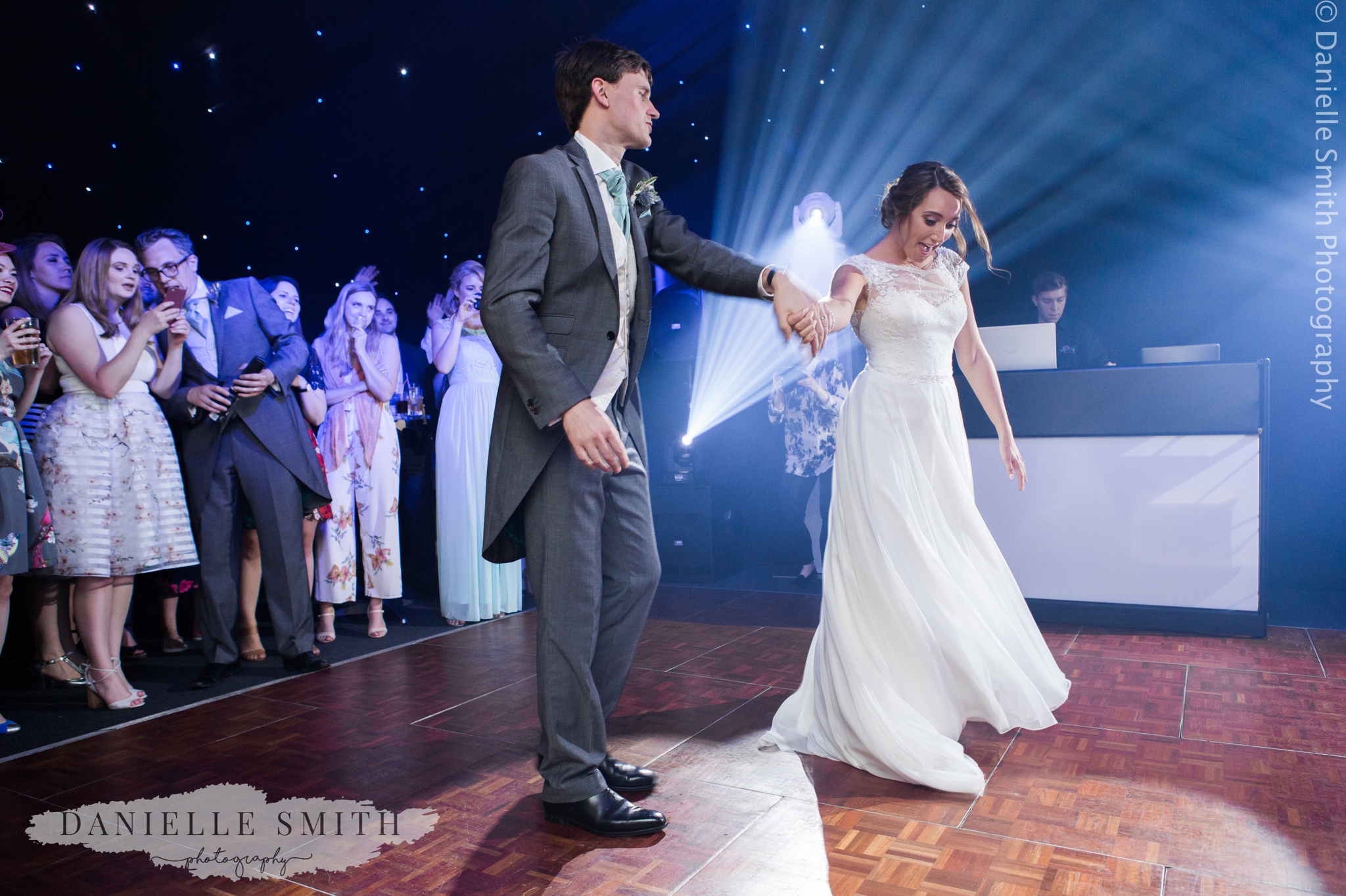 bride and grooms first dance - relaxed marquee wedding