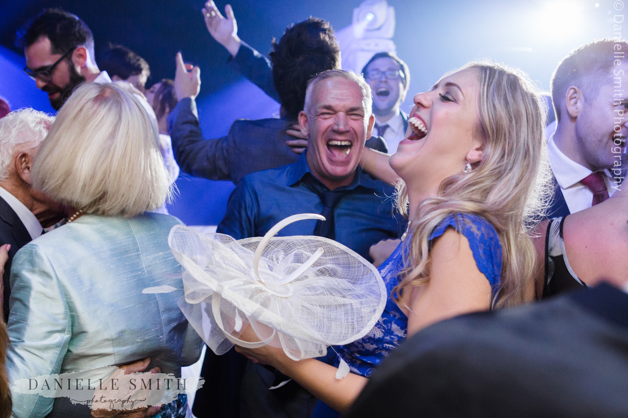 wedding guests having fun on dance floor