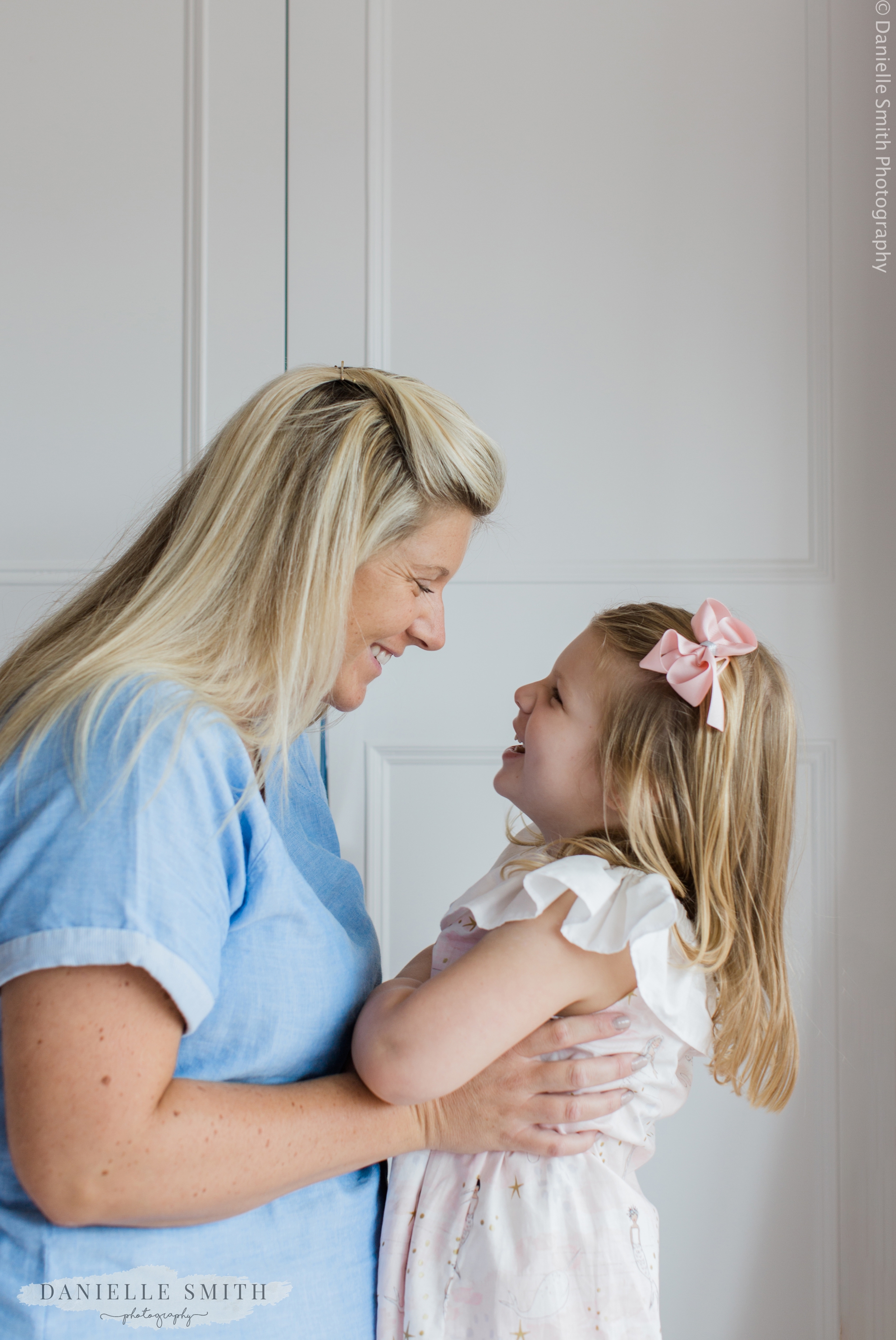 mum and daughter laughing