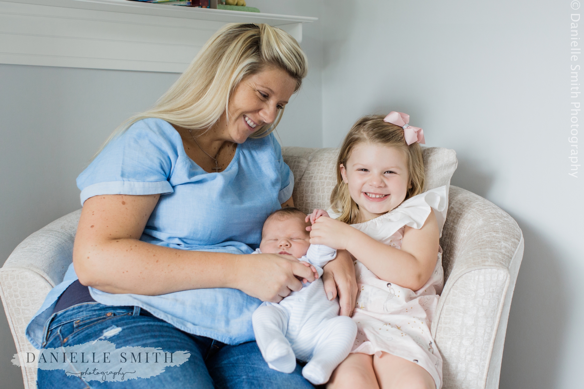mum and 2 children in nursery