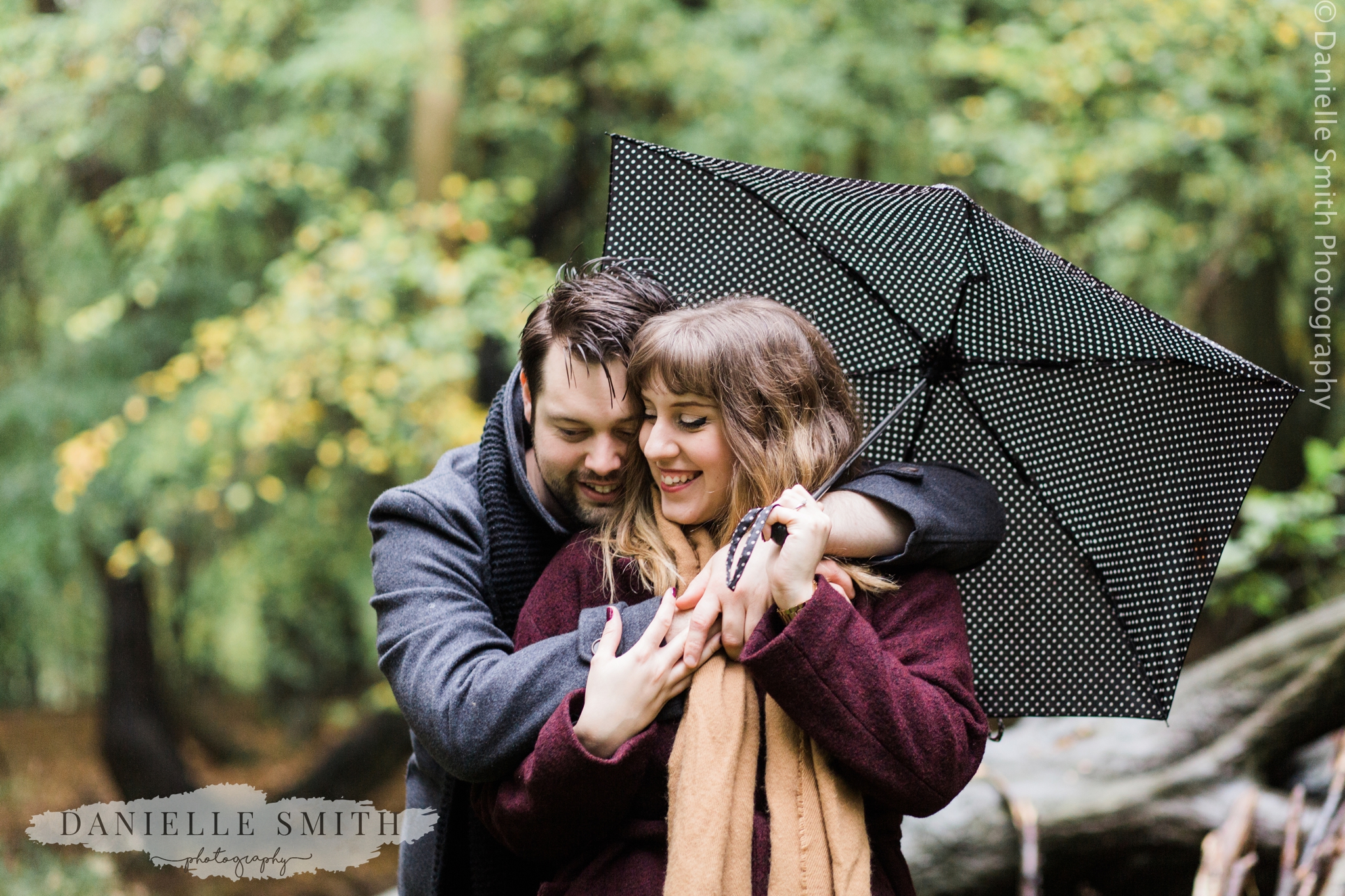 couple hugging in rain