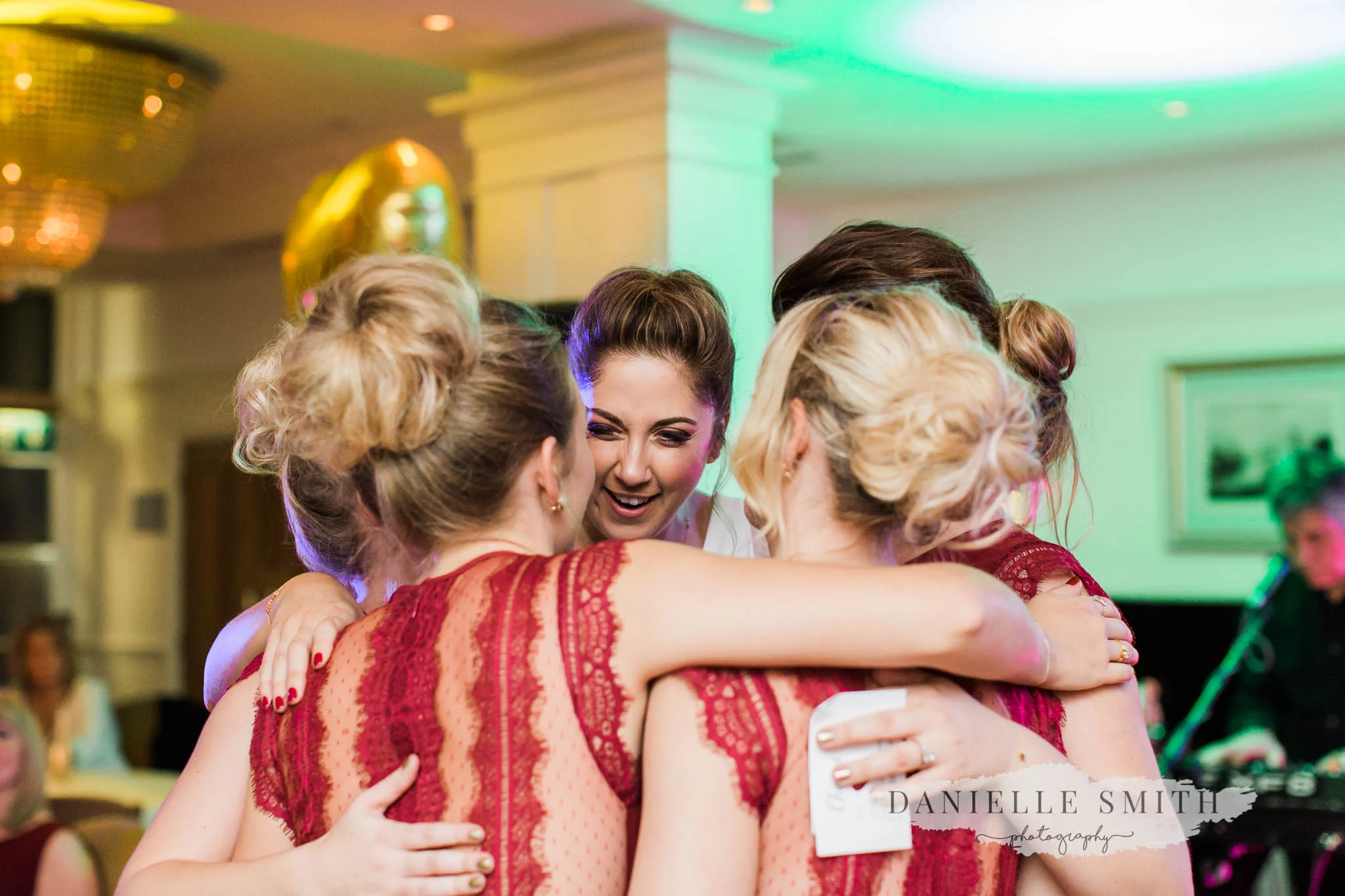 bridesmaids group hug - orsett hall wedding