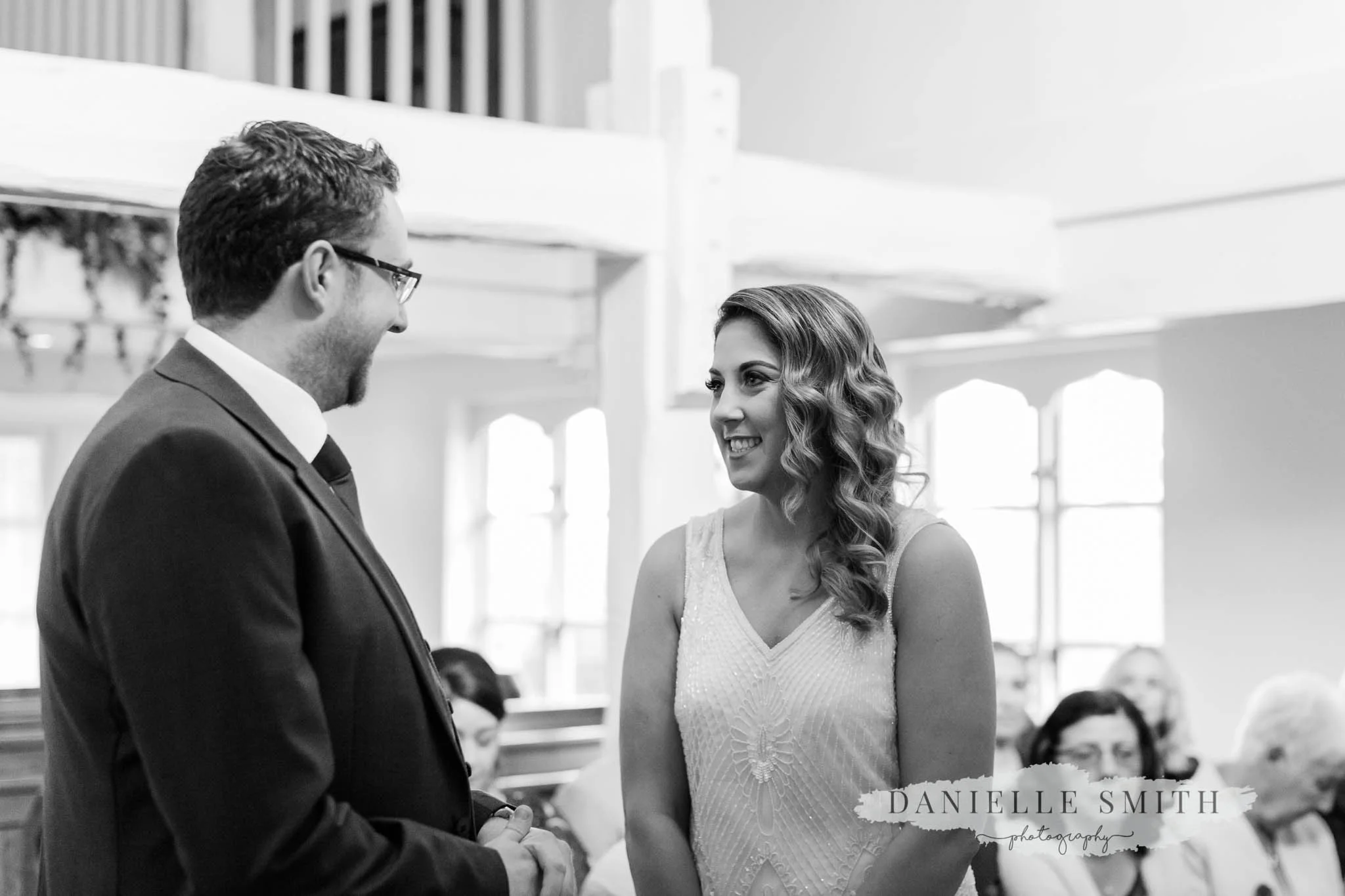 bride and groom during ceremony at orsett hall