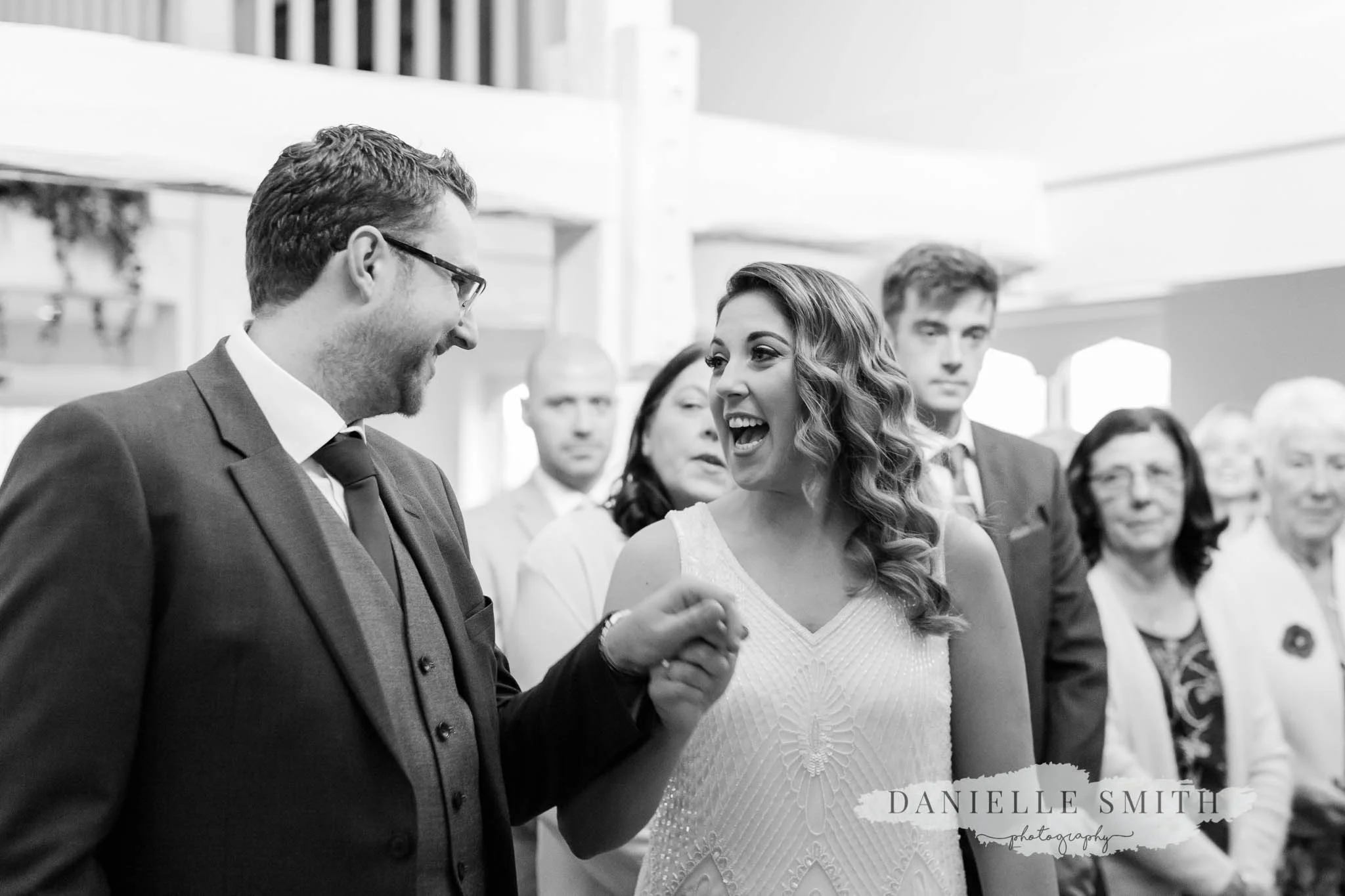 bride and groom cheering when married