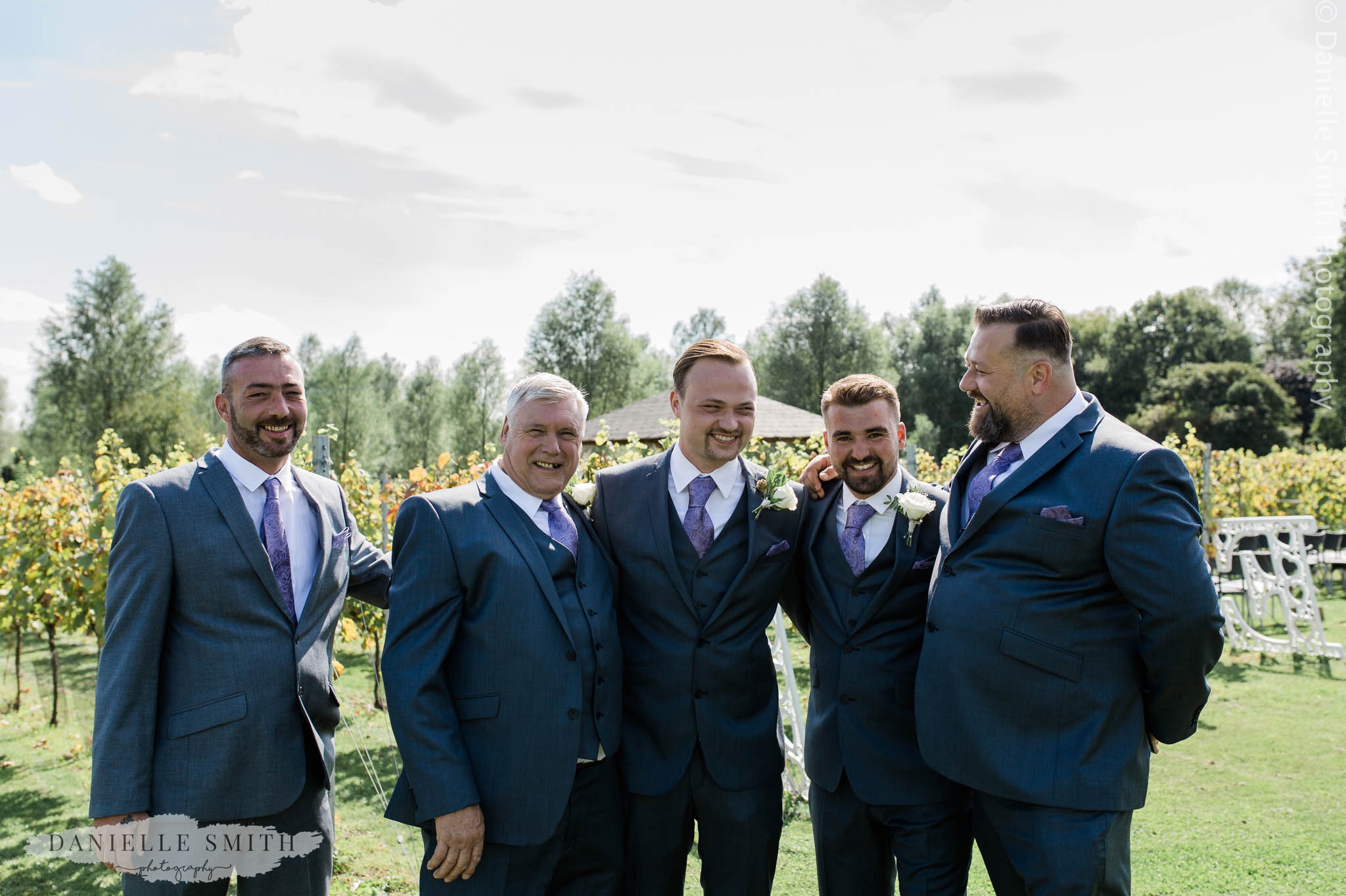 groom and groomsmen at west street vineyard
