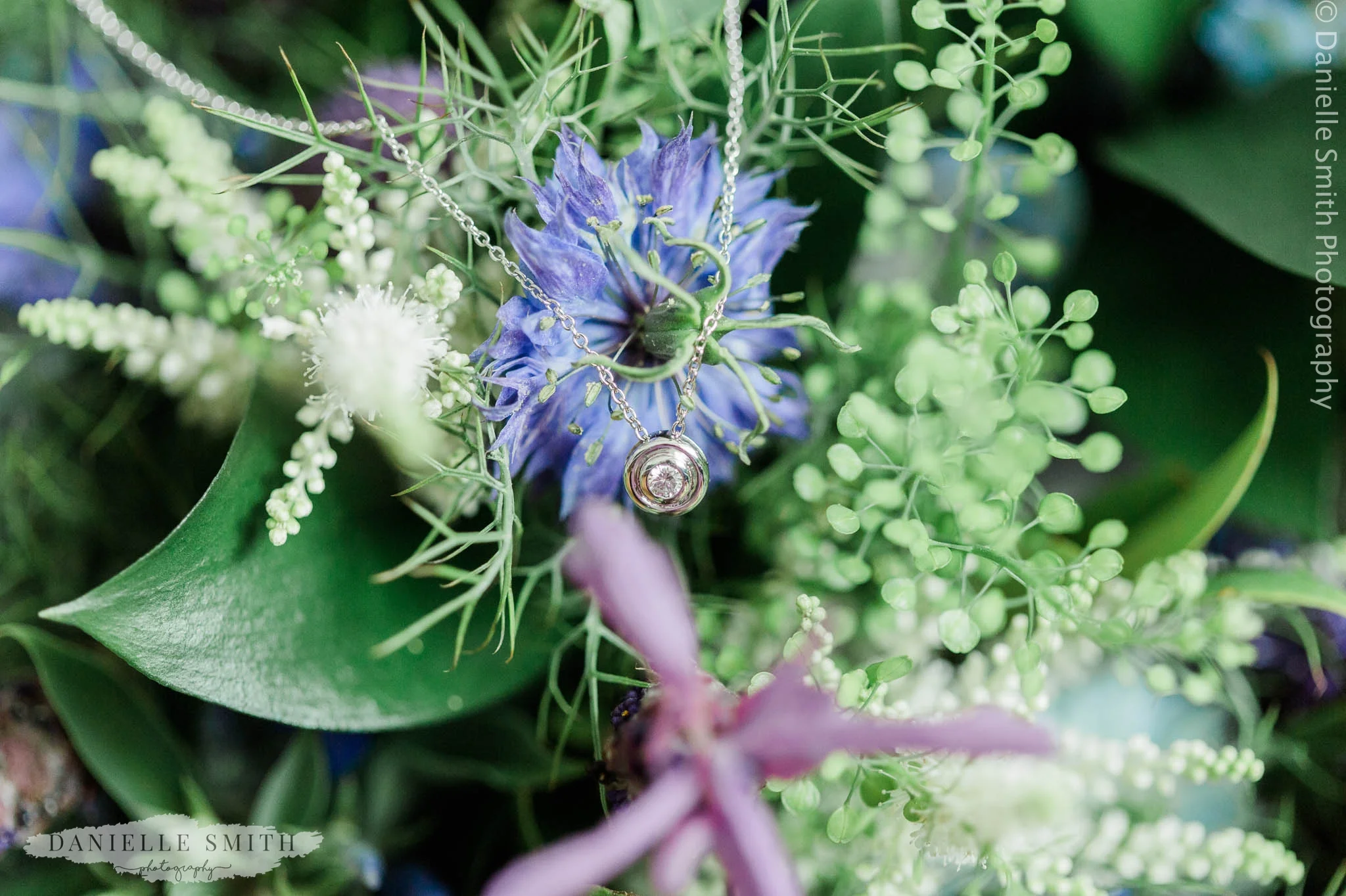 necklace on wedding bouquet
