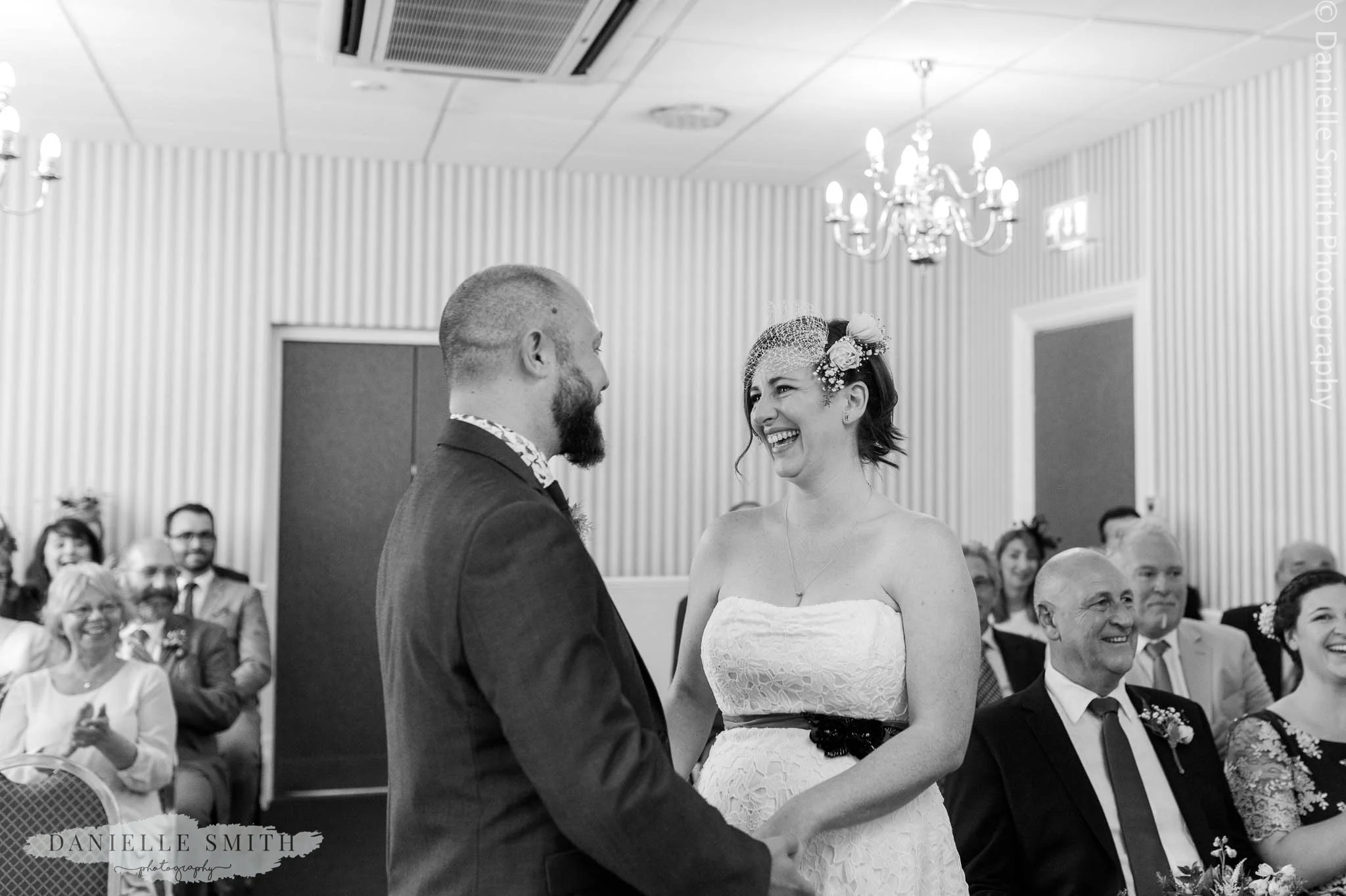 bride and groom smiling - relaxed and fun wedding