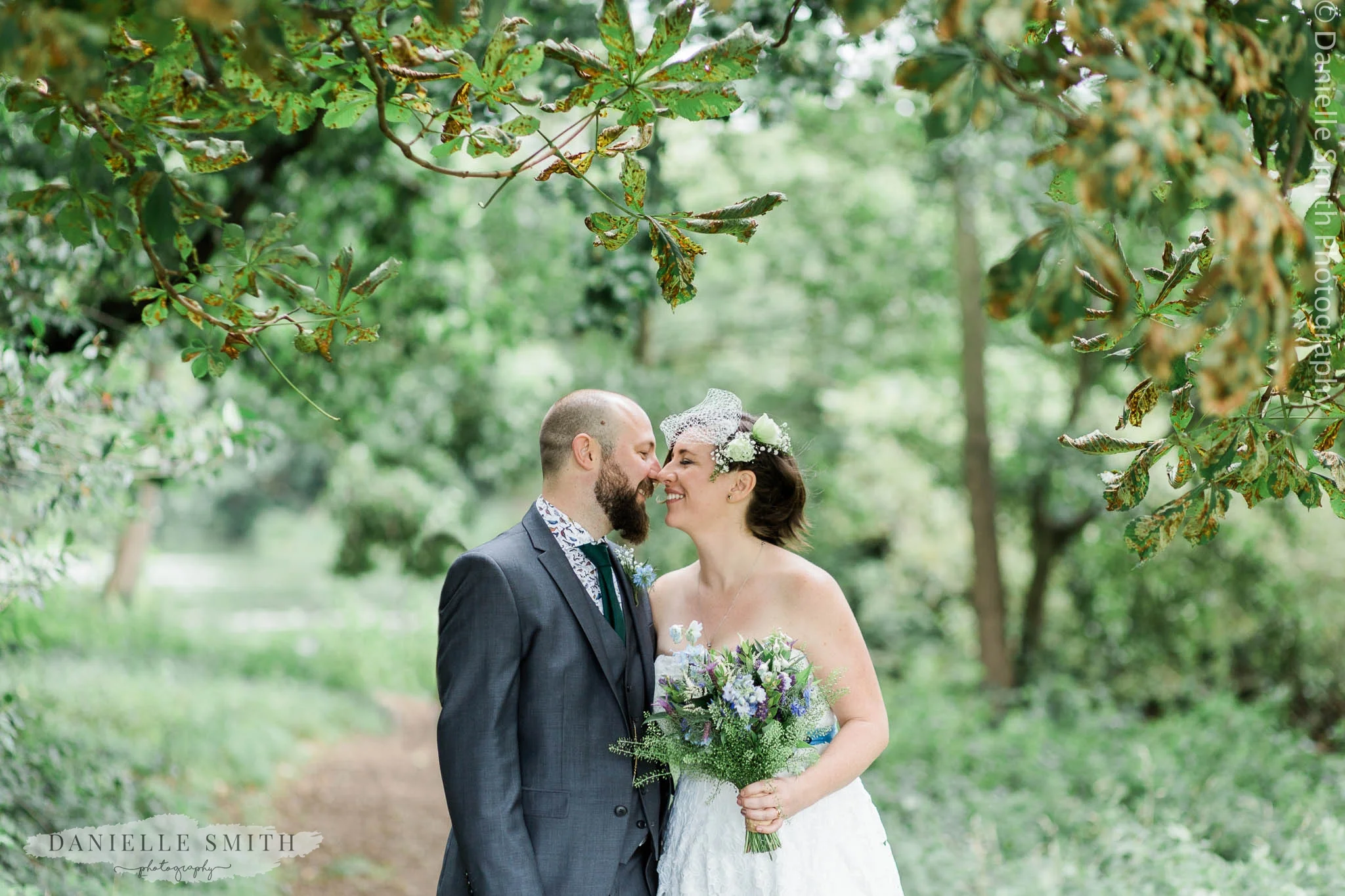 bride and groom in wanstead park