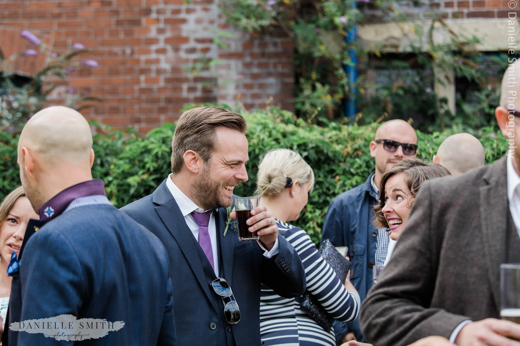 wedding guests laughing - east london wedding