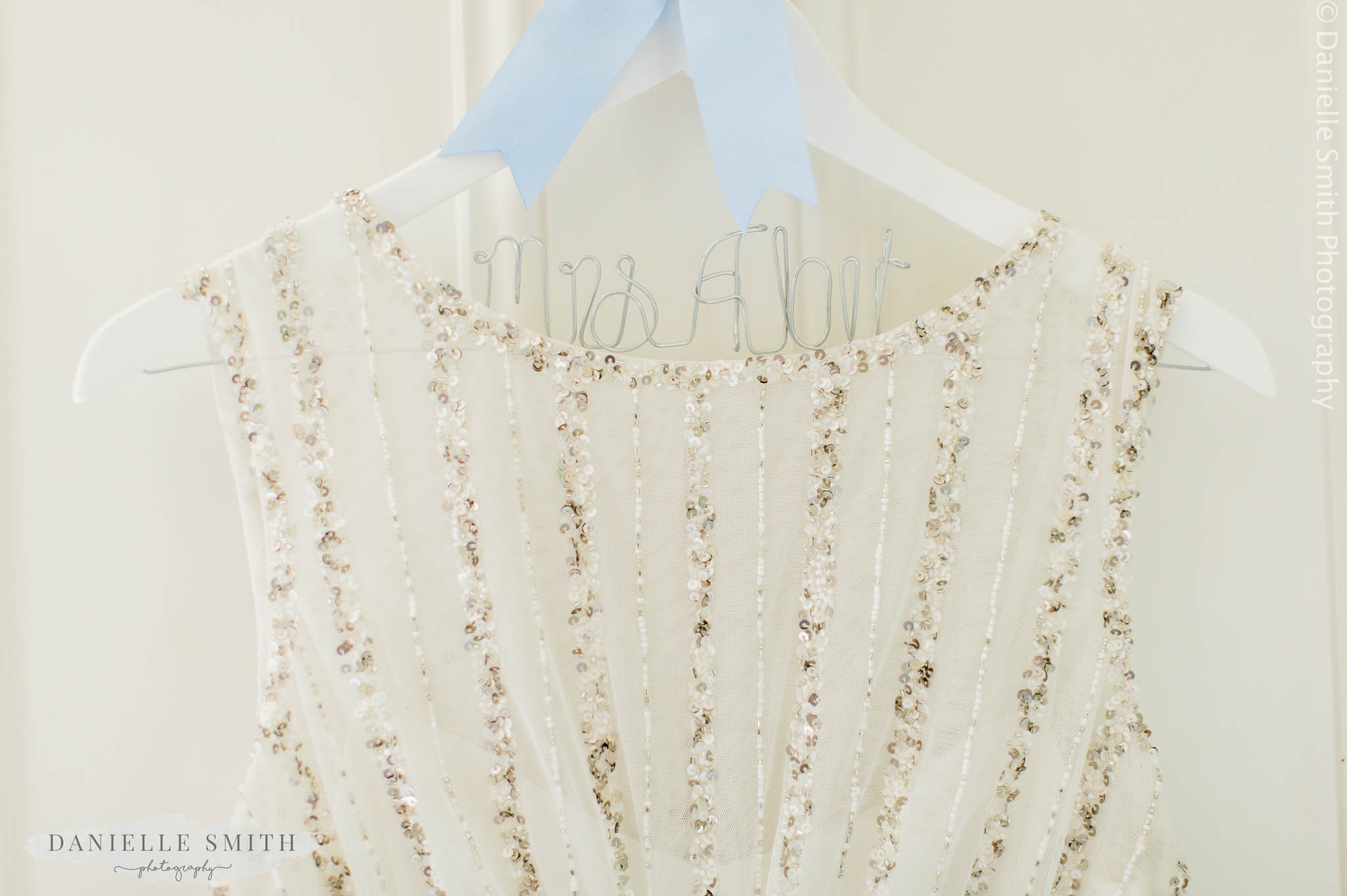personalised bridal hanger with wedding dress