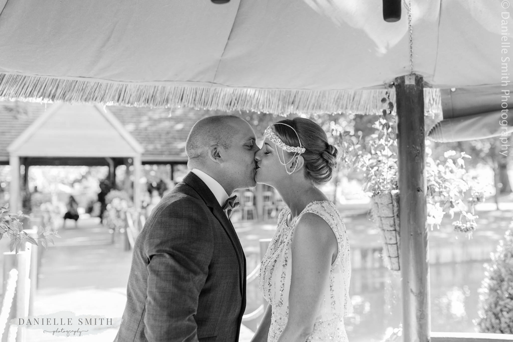 bride and grooms first kiss