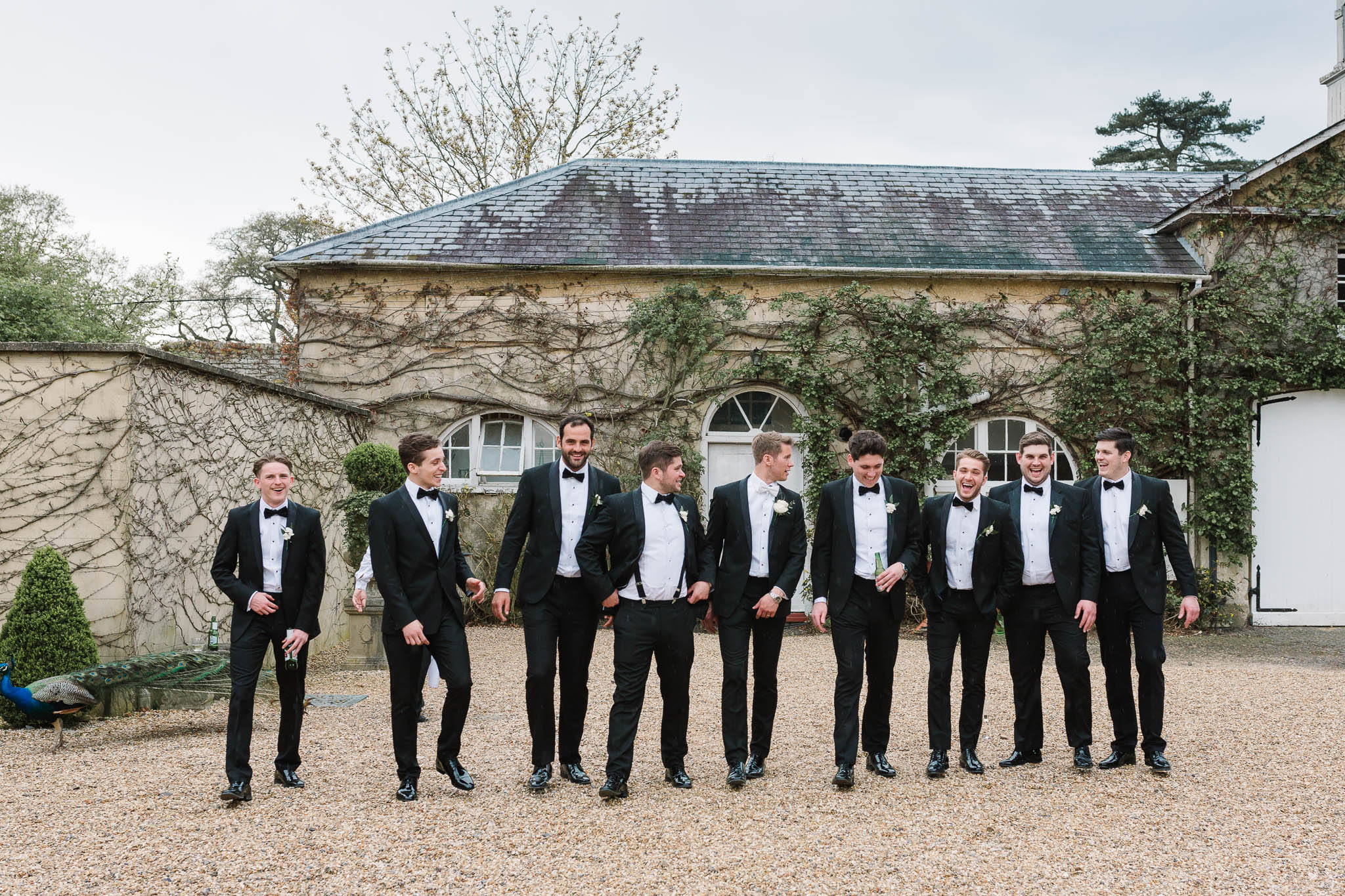 groom and groomsmen walking - elegant and stylish wedding