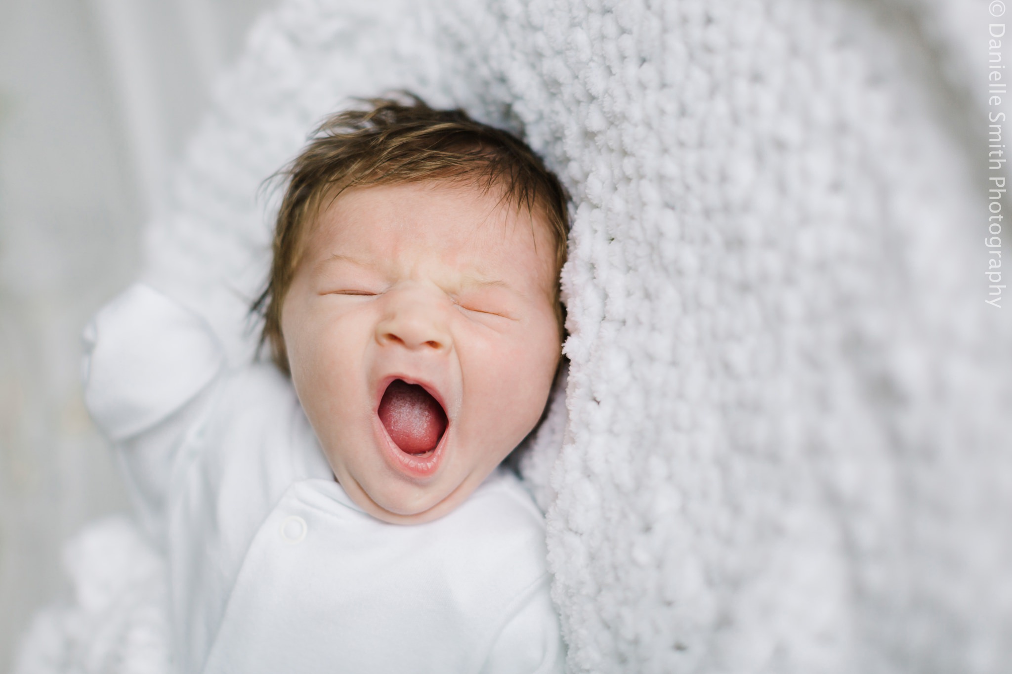 newborn baby yawning - Relaxed Newborn Baby Photography in South London