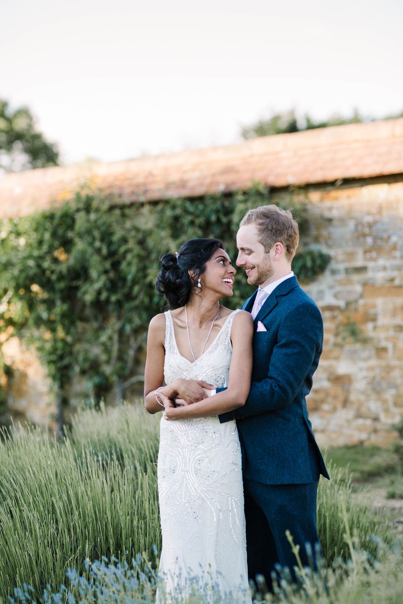 bride and groom in lavender