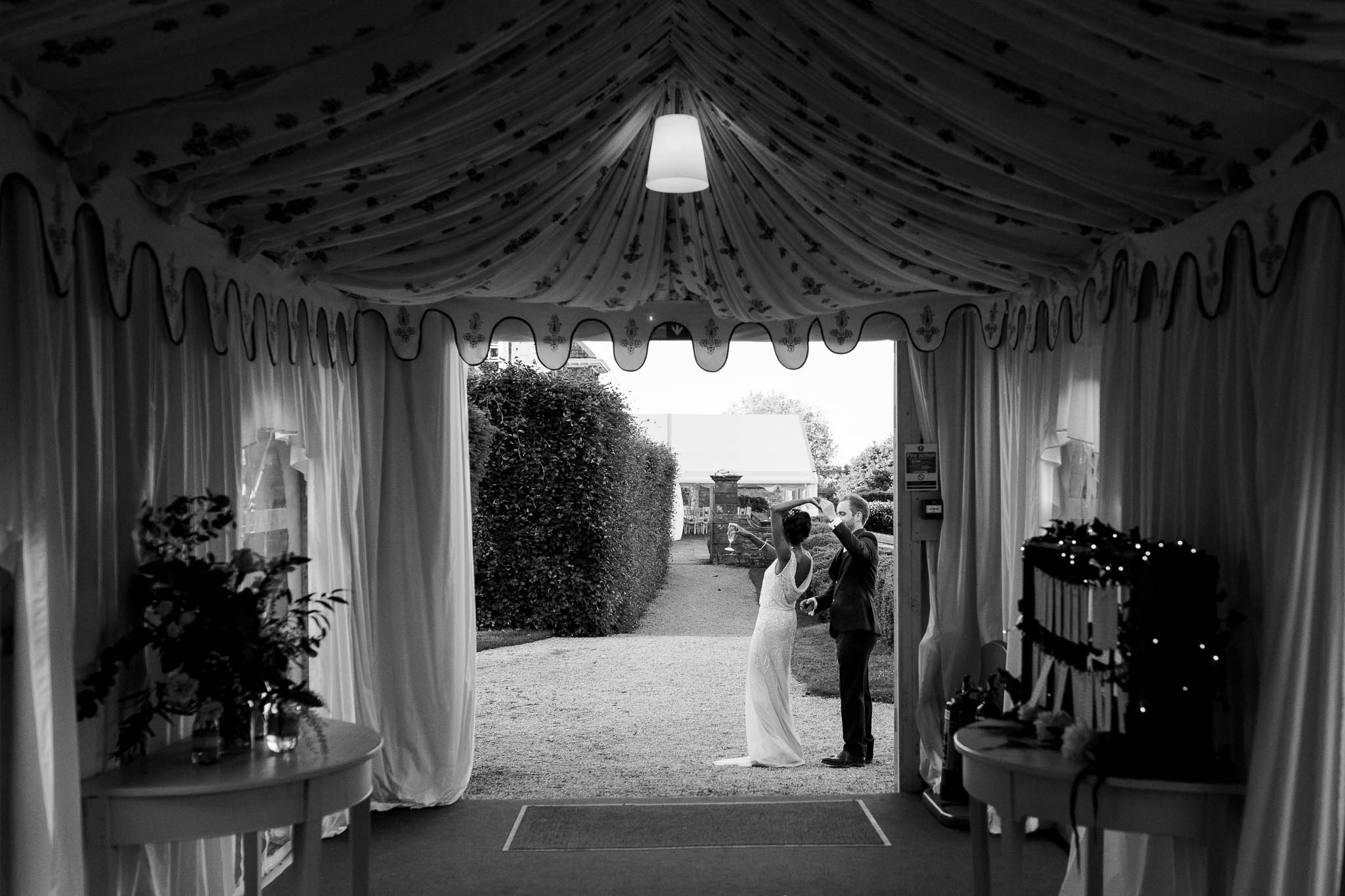 bride and groom practicing first dance