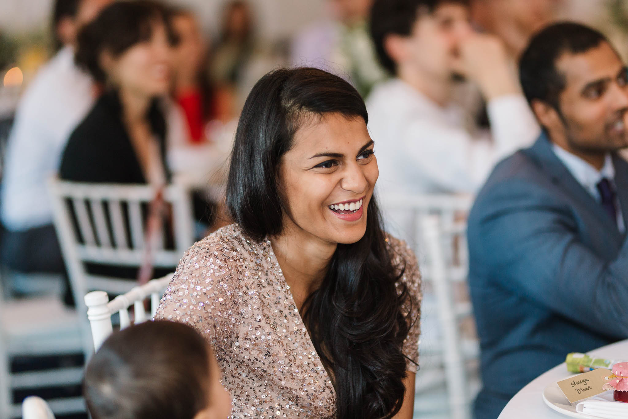 bridesmaid laughing at speeches