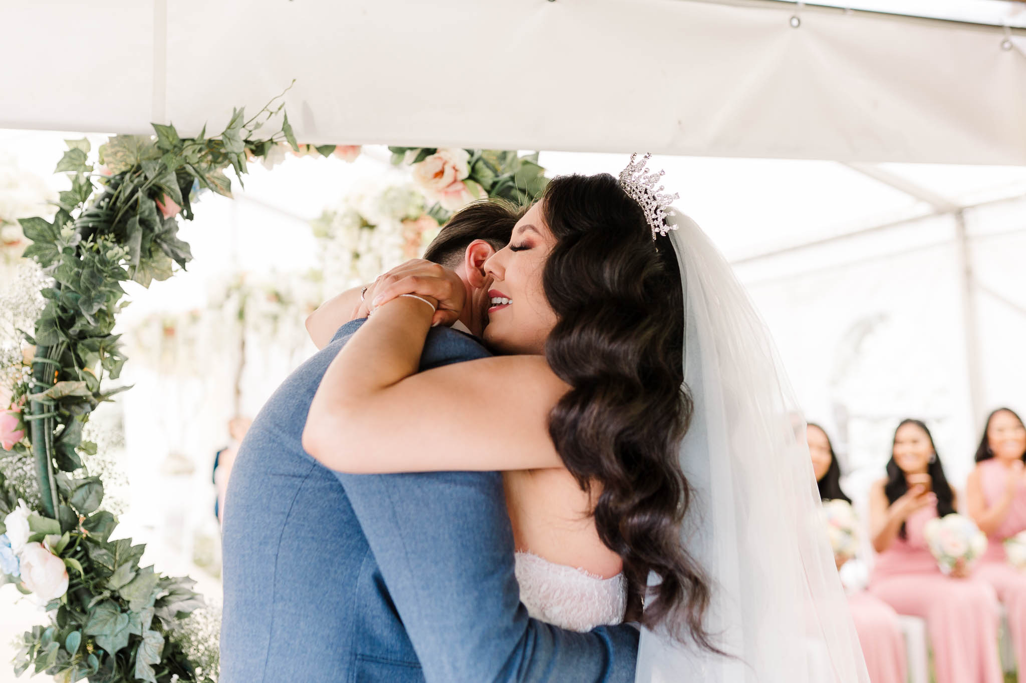 bride and groom hug at end of ceremony