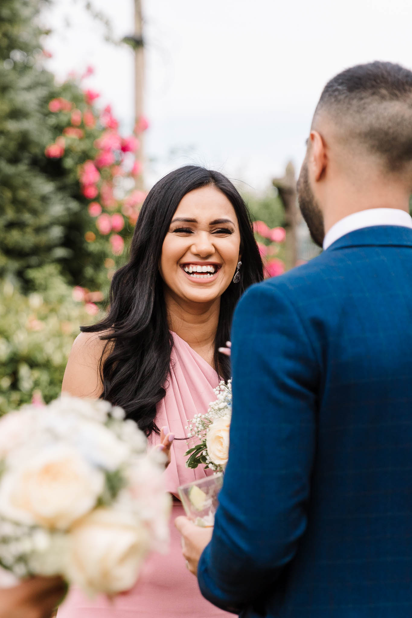 bridesmaid laughing at fun and relaxed wedding