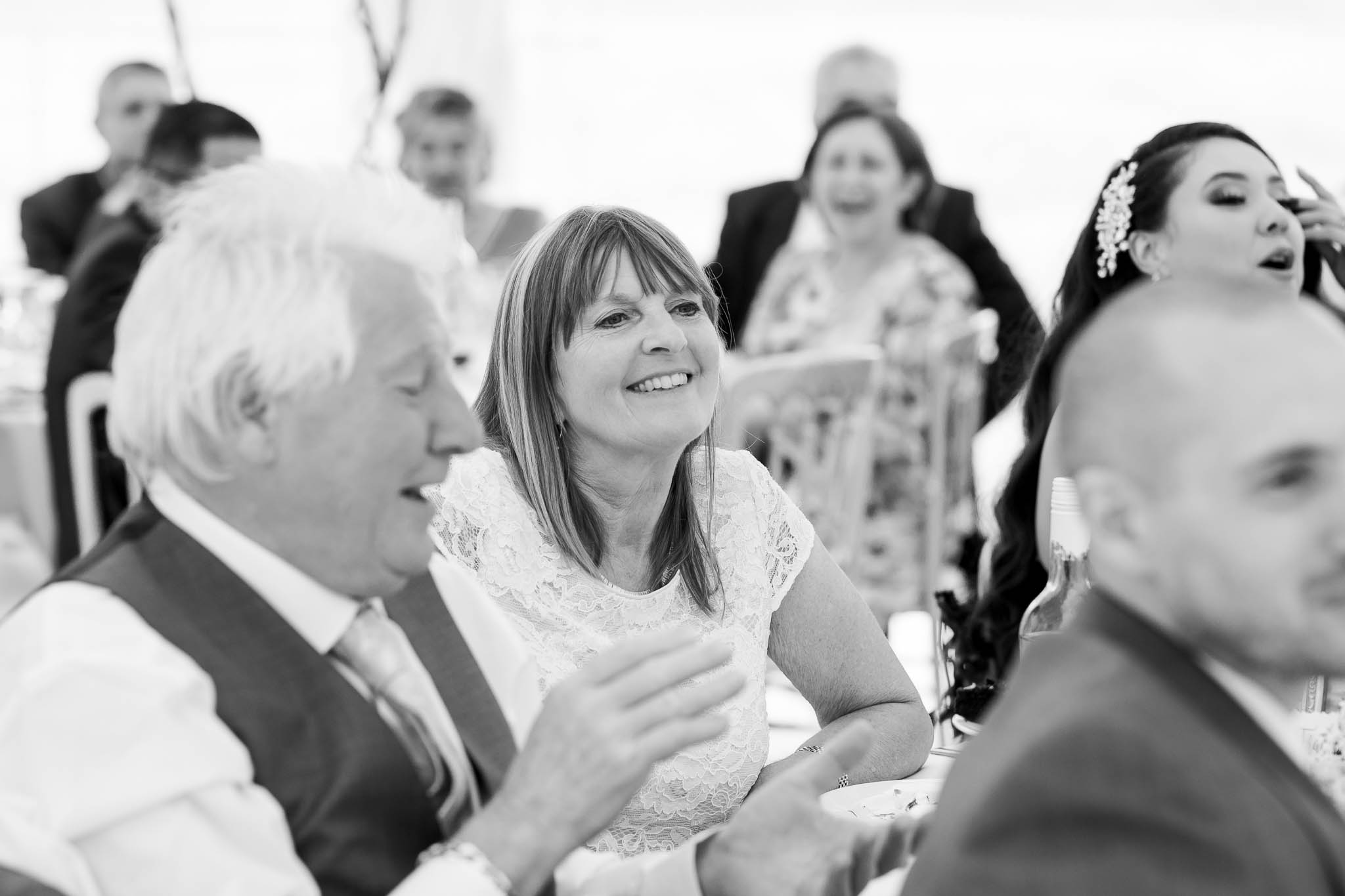 mother of groom laughing at speech