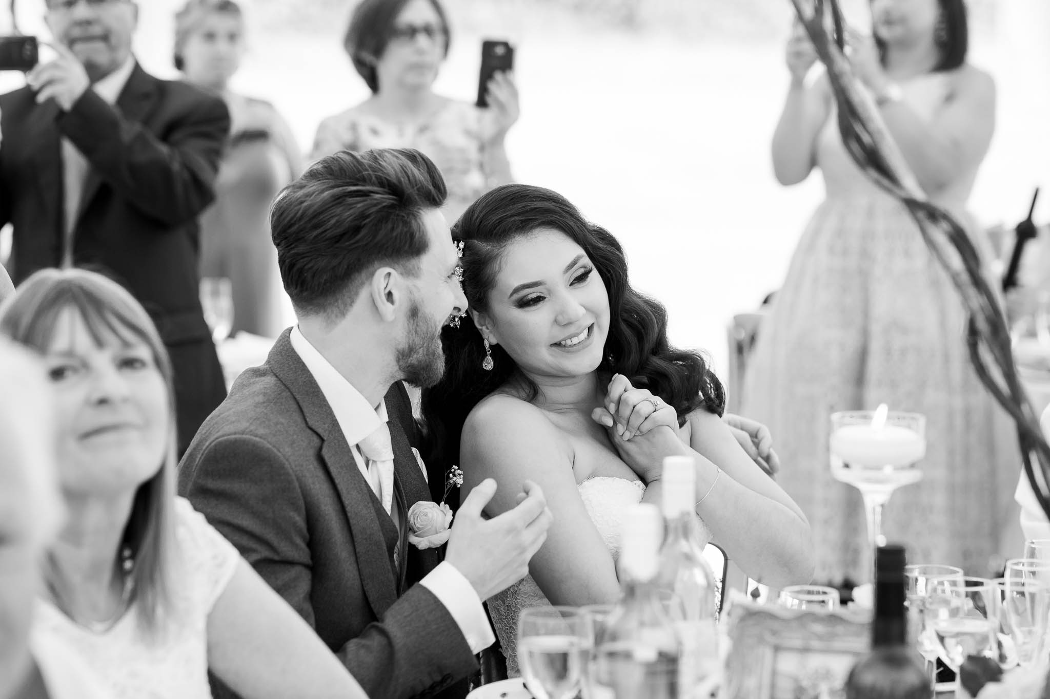bride and groom at table