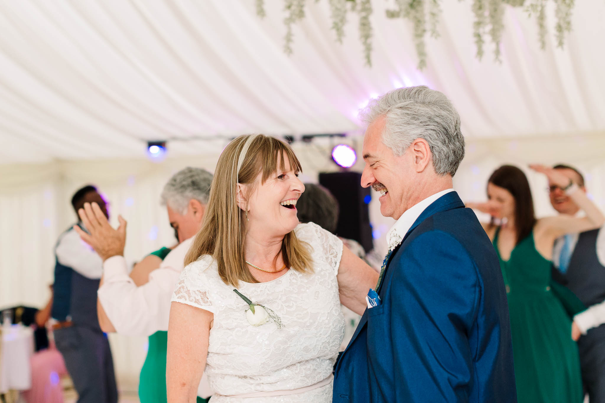 parents dancing at fun and relaxed wedding
