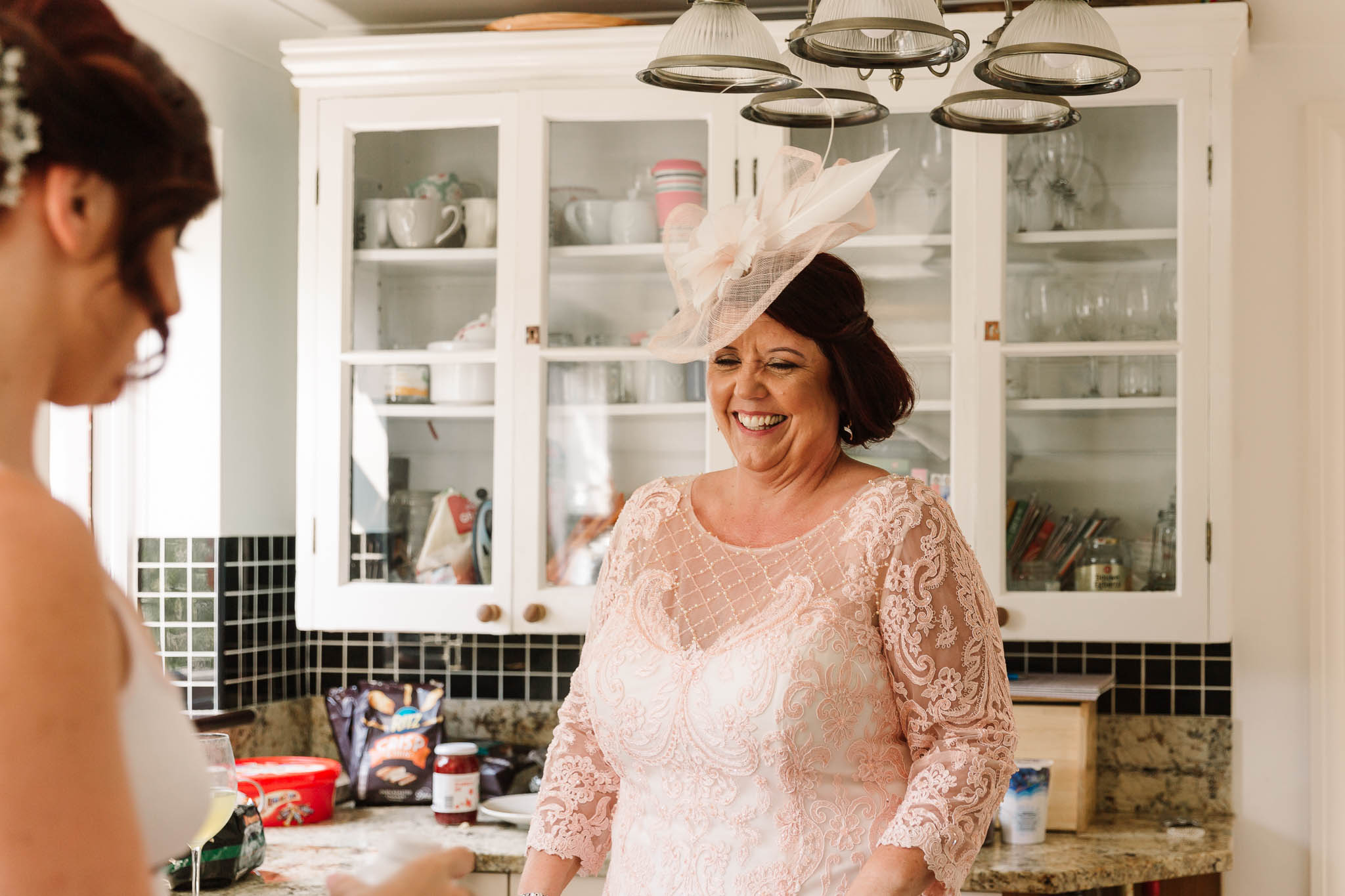 mother of the bride laughing