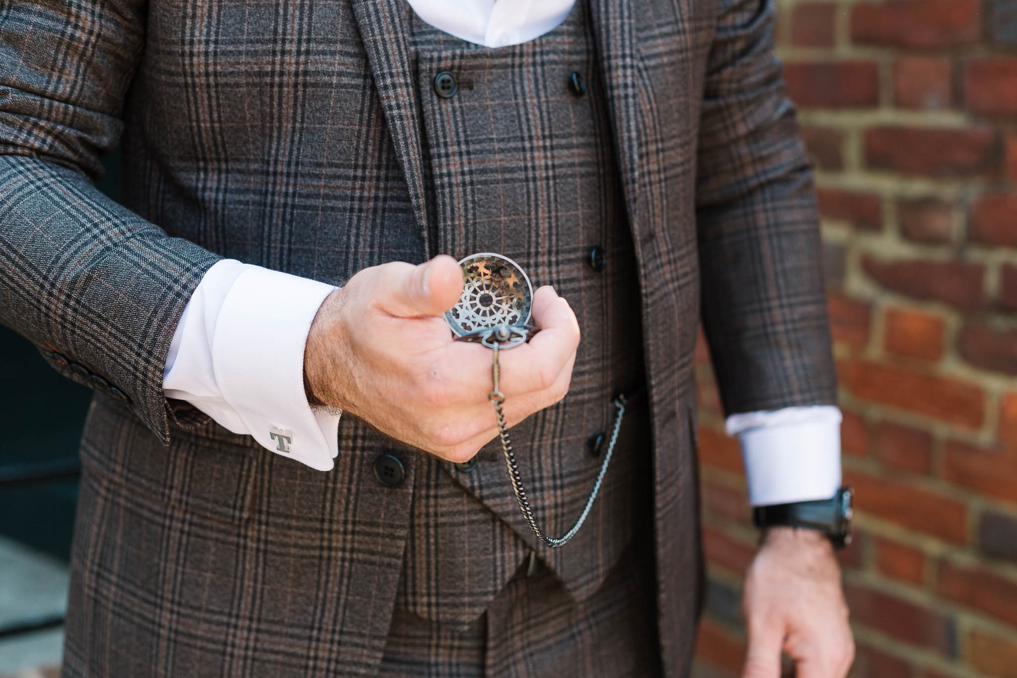 pocket watch and tweed suit