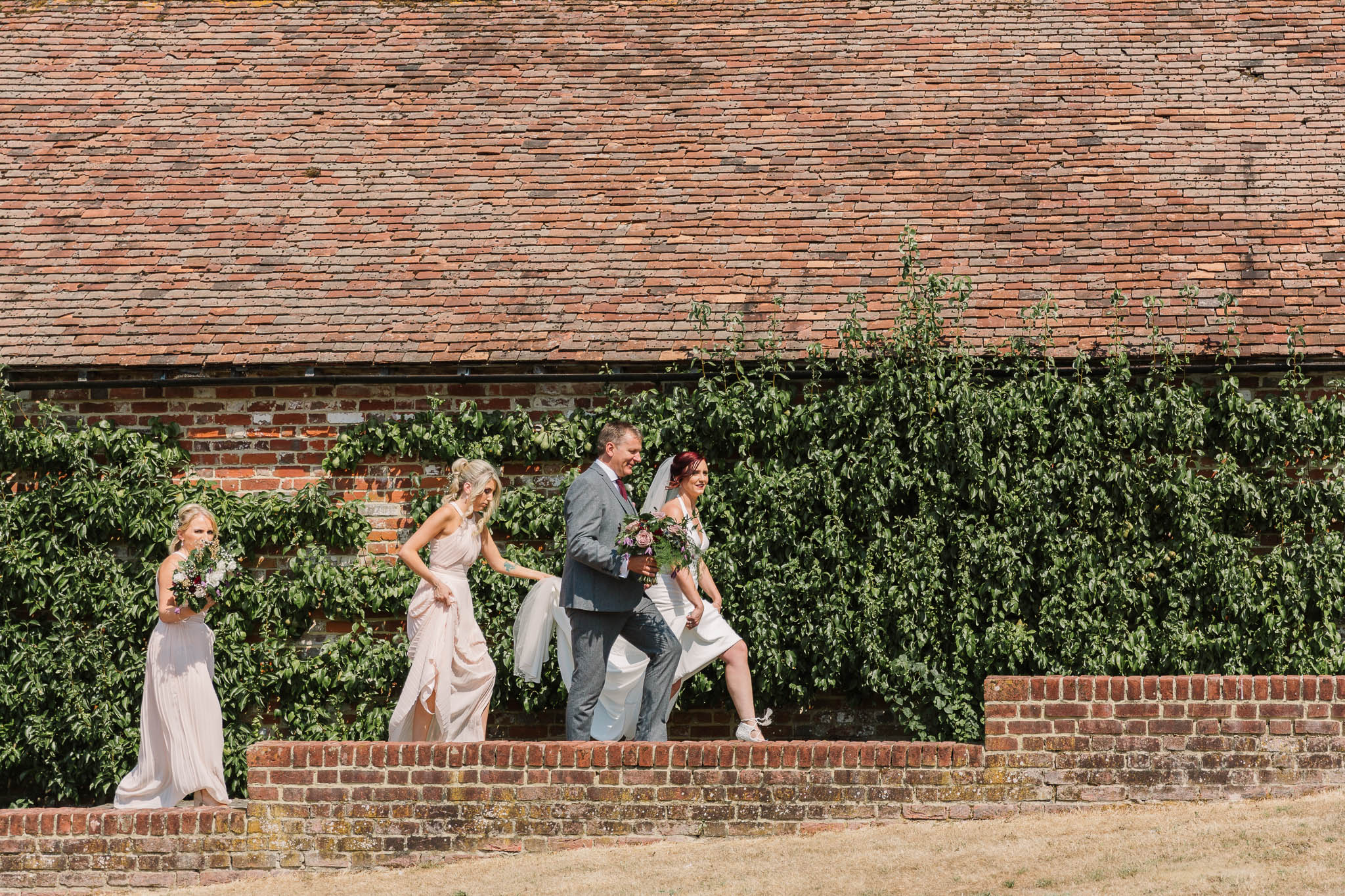 bride and dad walking towards aisle - ENGLISH COUNTRY WEDDING AT SWARLING MANOR