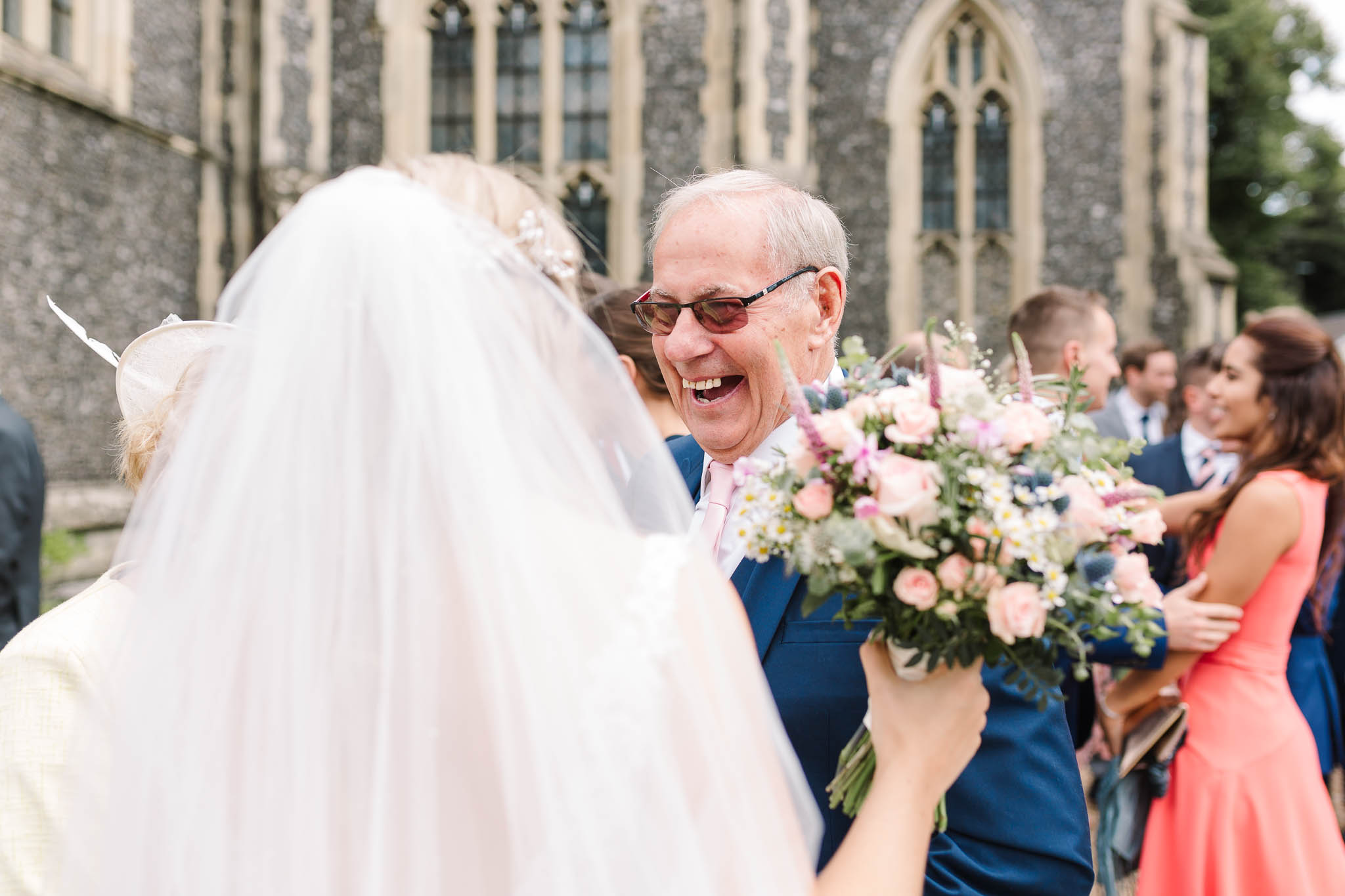 bride greeting father of the groom
