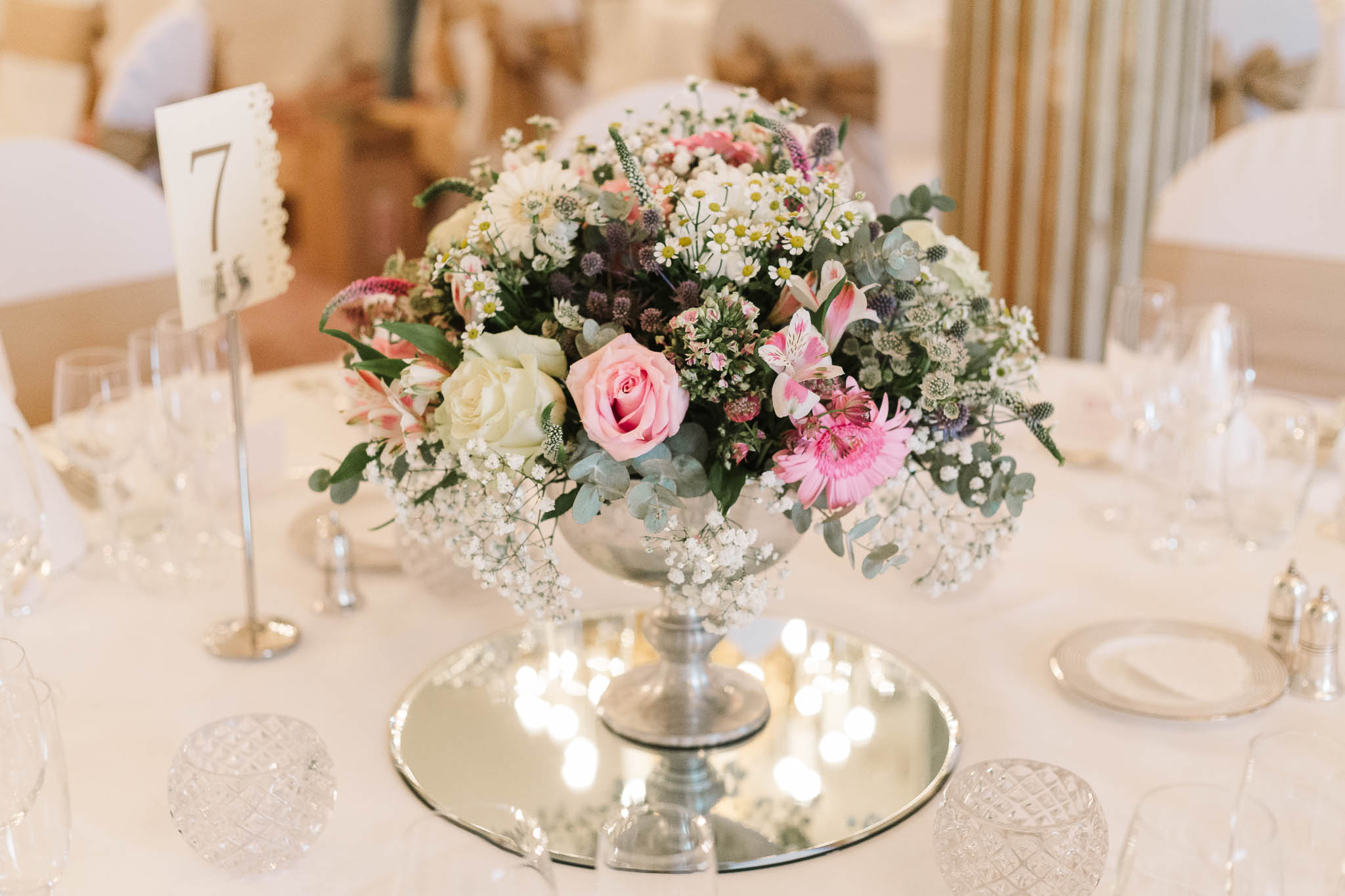 soft pastel flowers for centre piece - Elegant London Wedding at the Royal Automobile Club