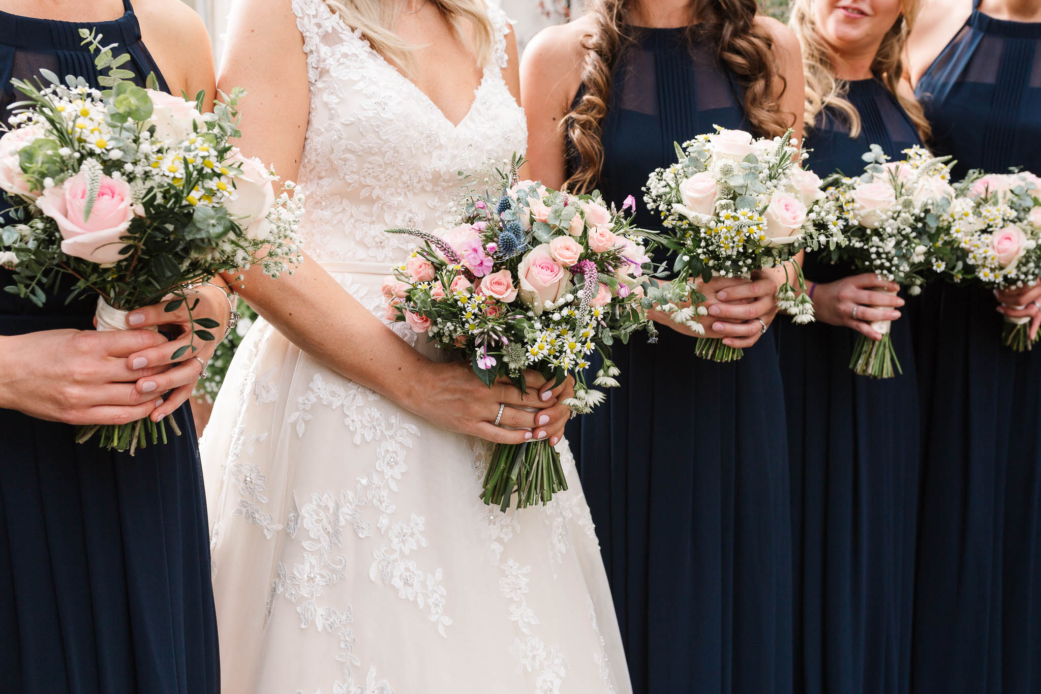 bride and bridesmaids flowers - Elegant London Wedding at the Royal Automobile Club