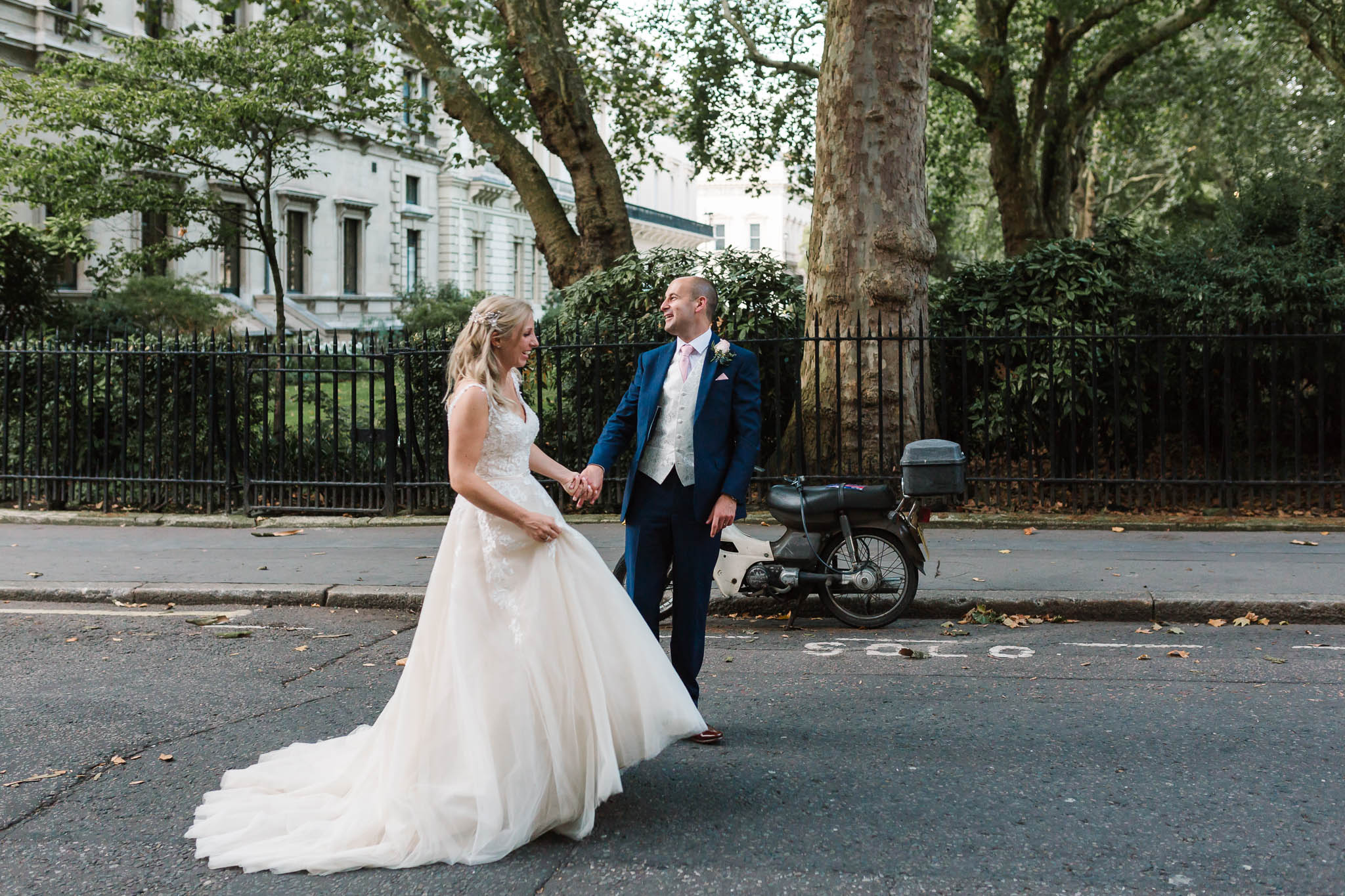 bride and grooms walking on london streets