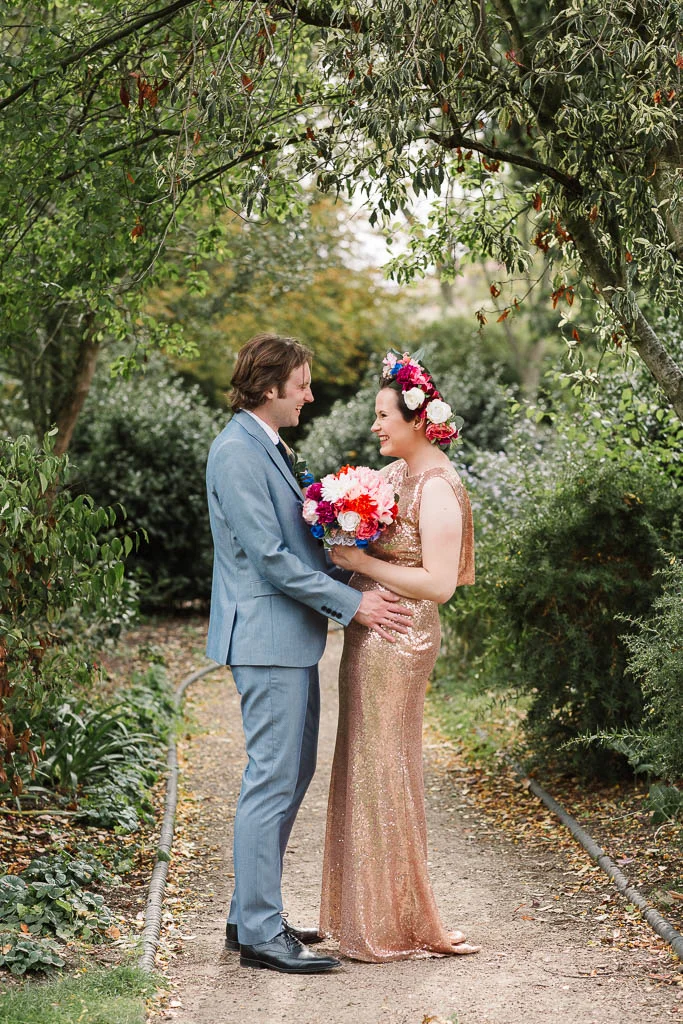bride and groom laughing - LANGTONS HOUSE WEDDING AND CHILLED GARDEN RECEPTION AT HOME
