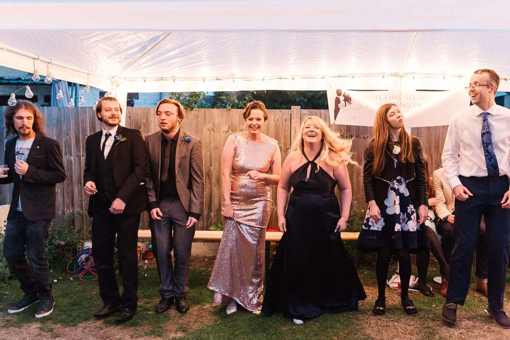 wedding guests dancing in garden