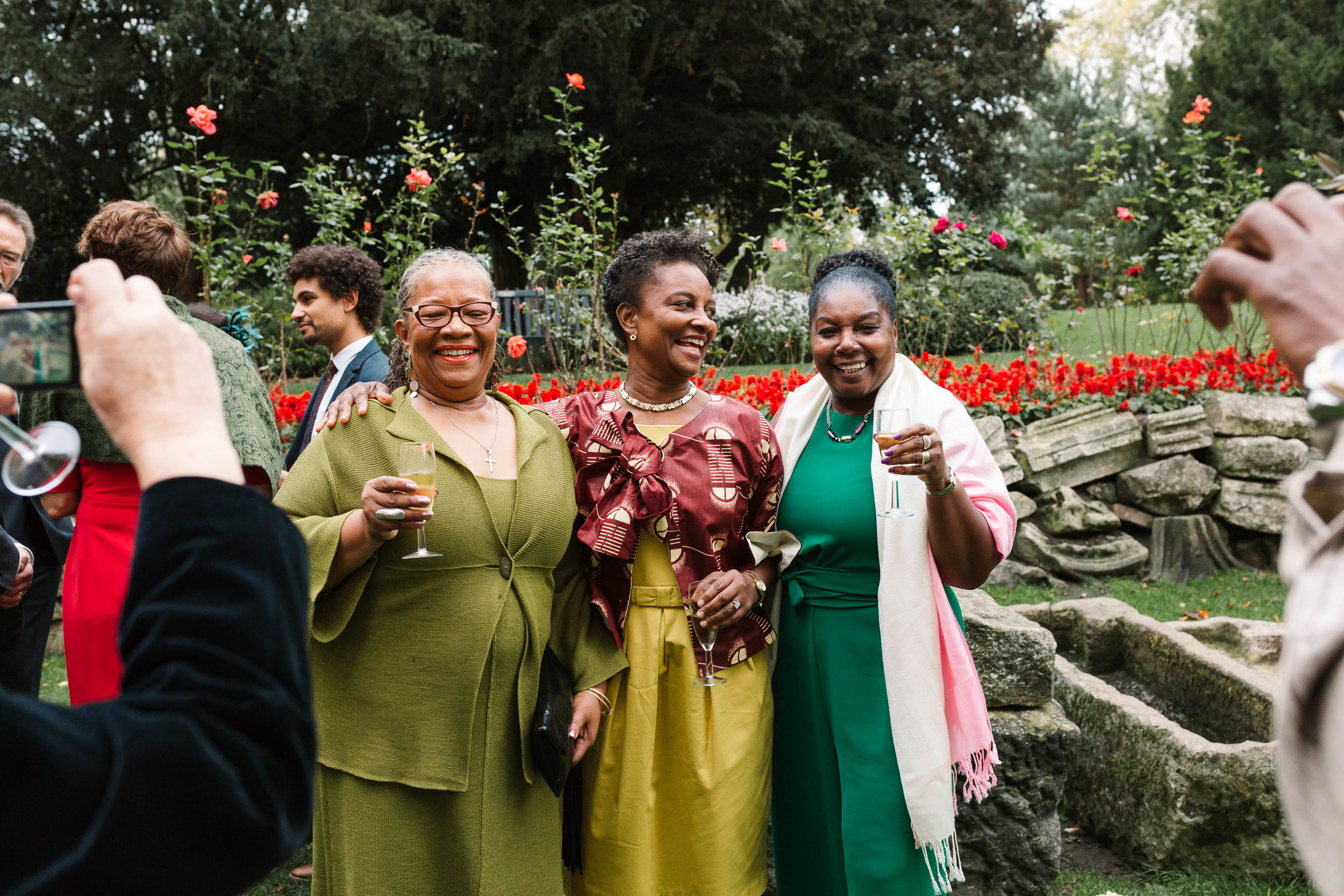 wedding guests smiling for photos