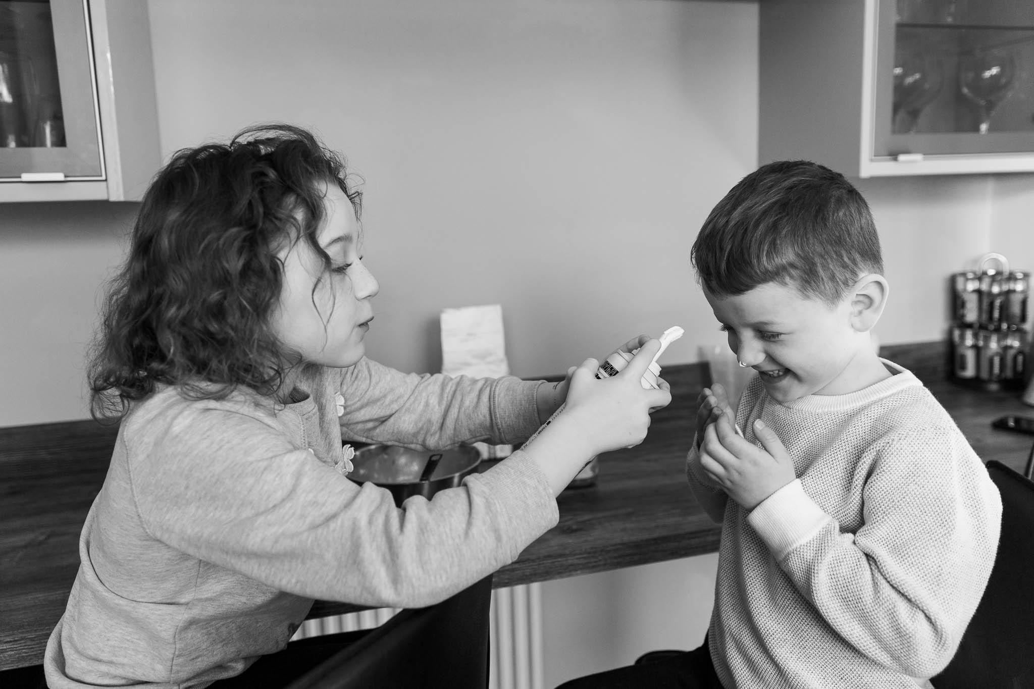 kids playing with squirty cream