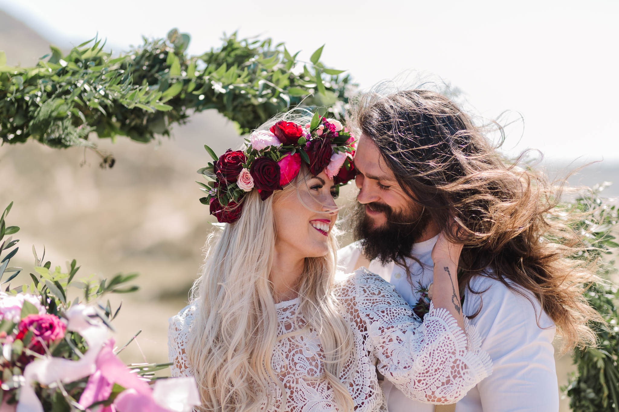 Wedding Photography on the Beach- bride and groom laughing