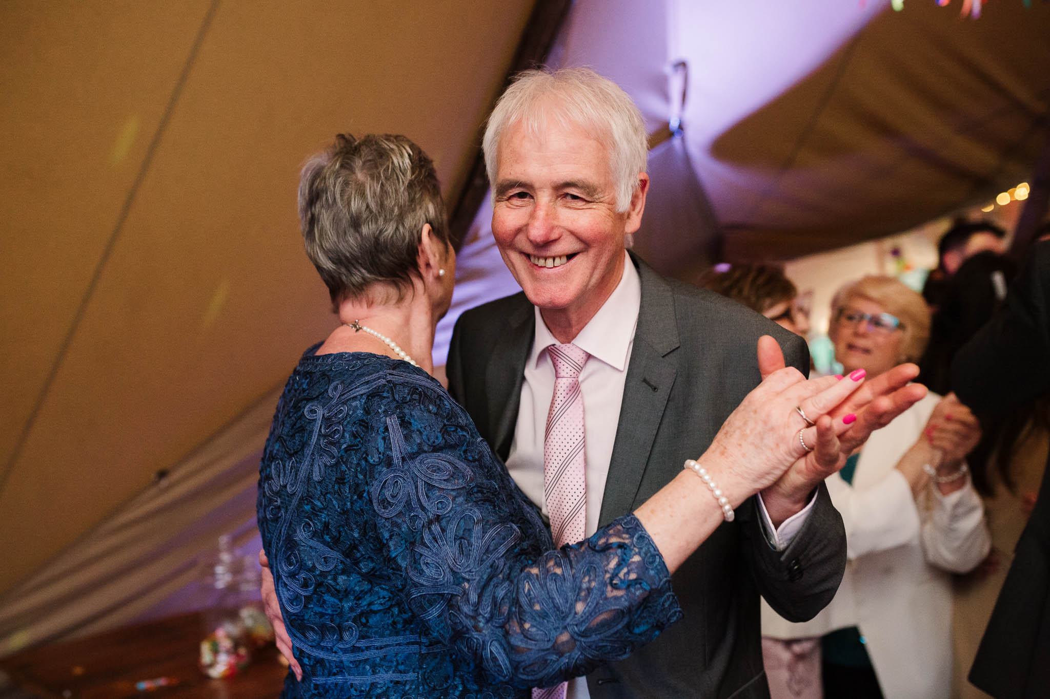 older couple dancing at wedding