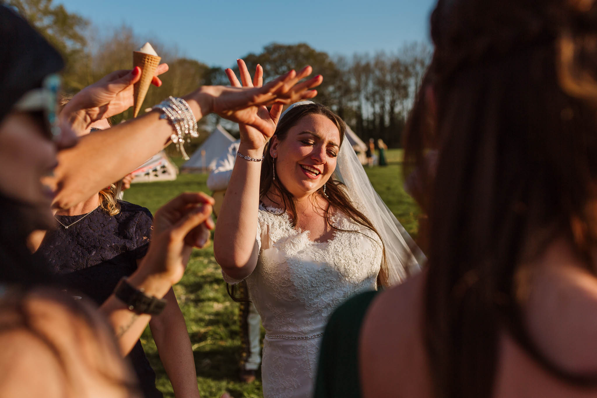 bride dancing with her friends