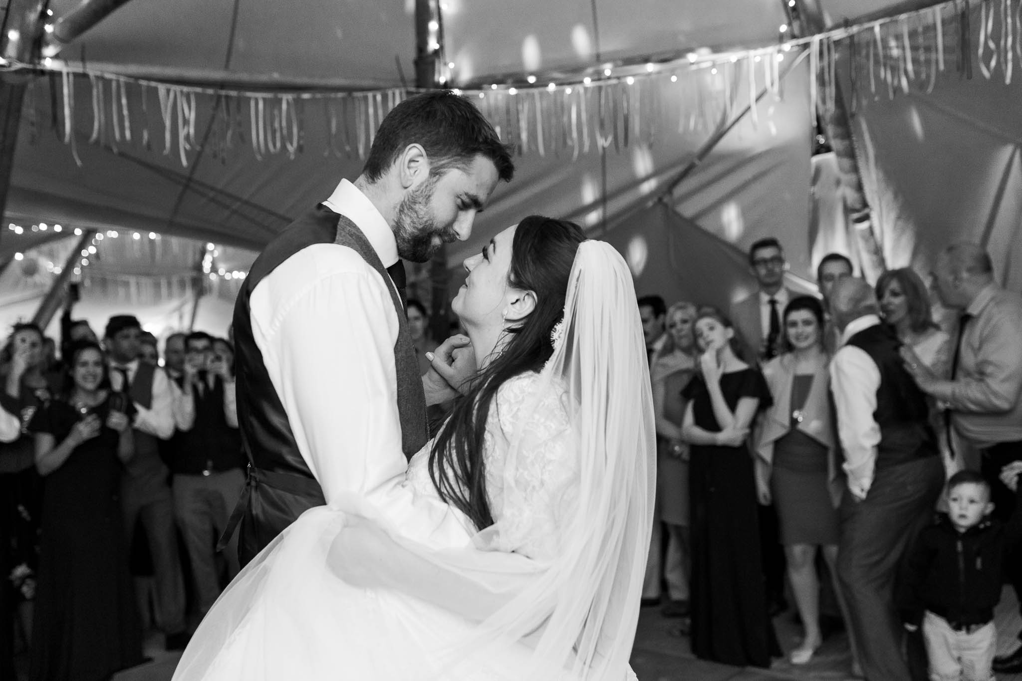bride and grooms first dance in tipi