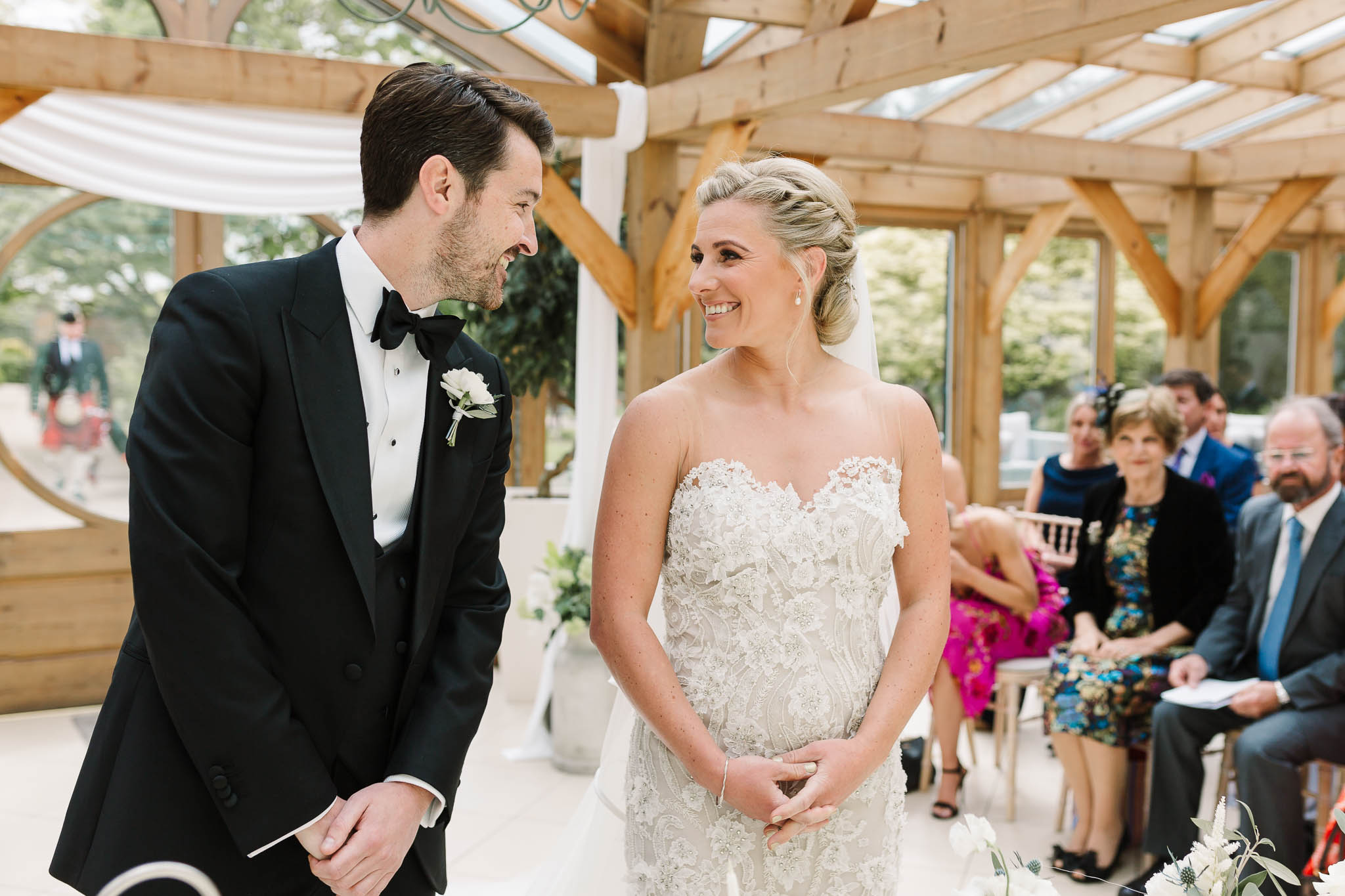 bride and groom looking at each other