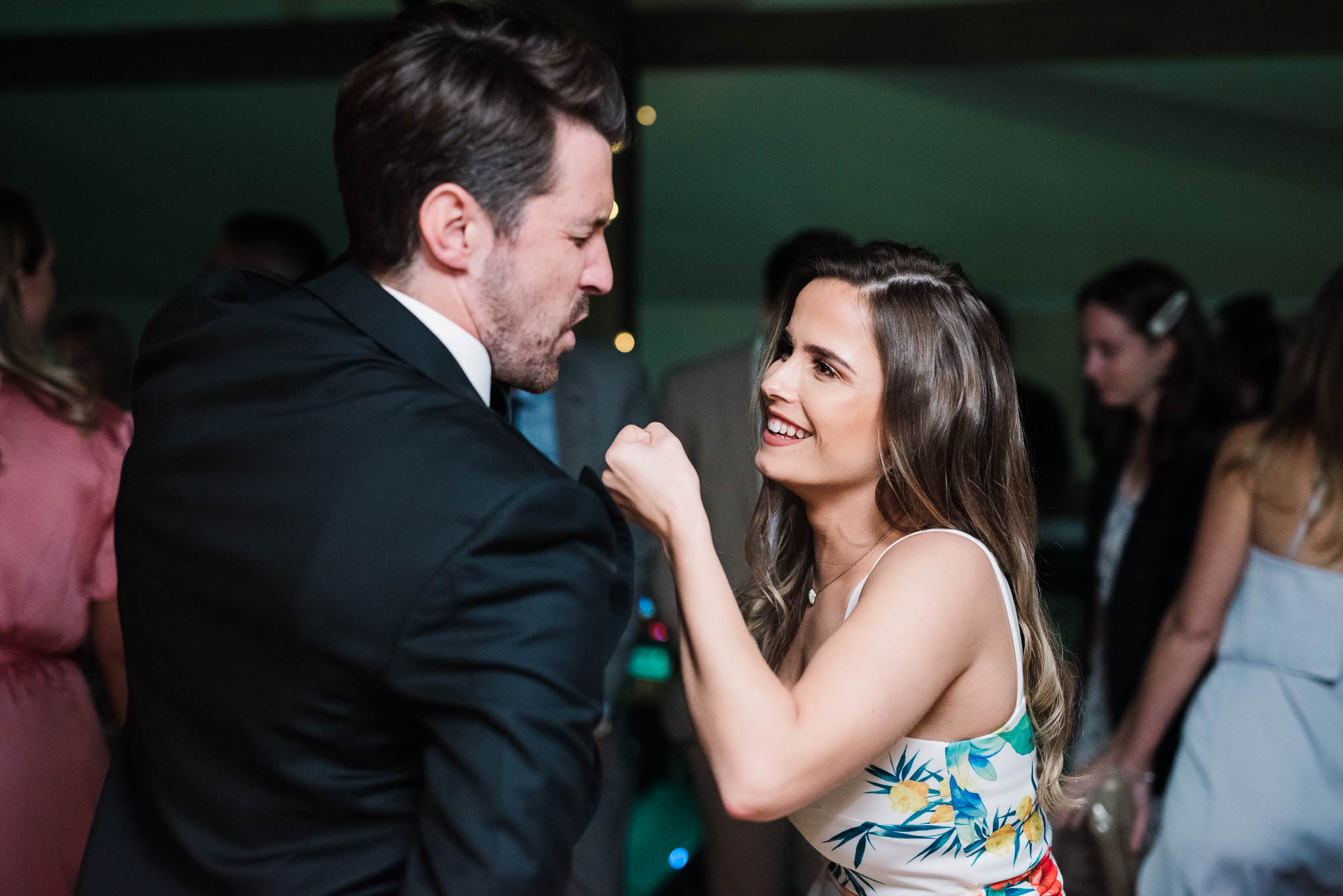 groom singing with guest