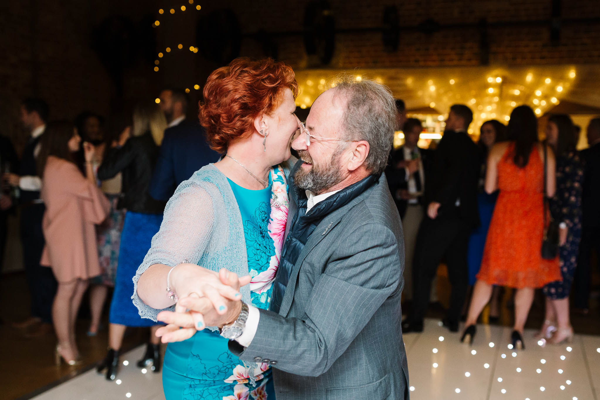 older couple dancing at wedding