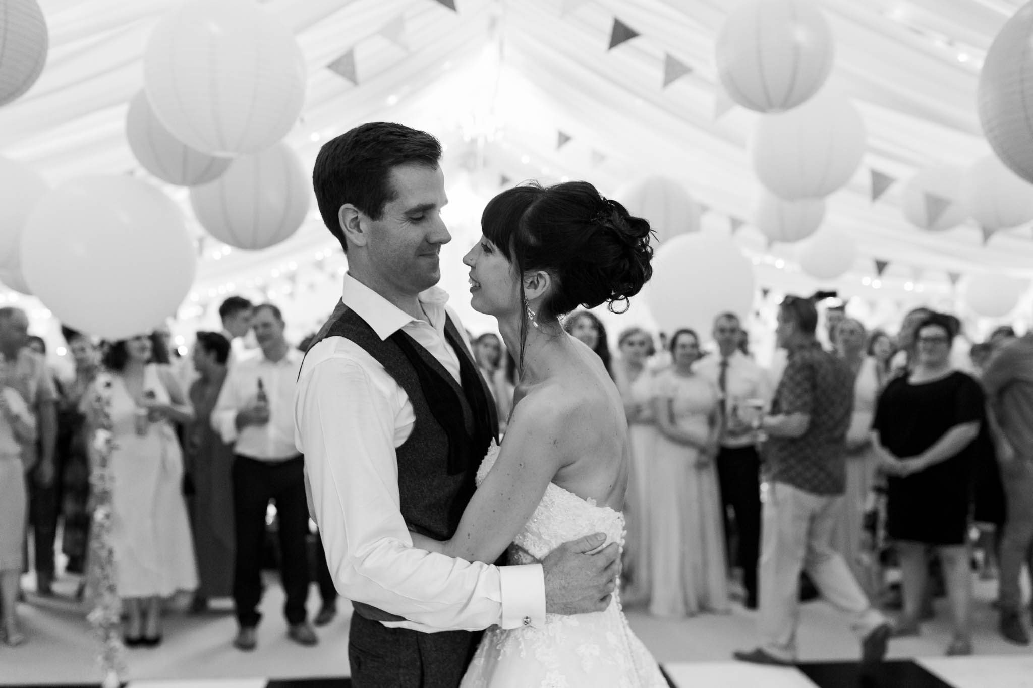 bride and groom dancing at alice in wonderland wedding