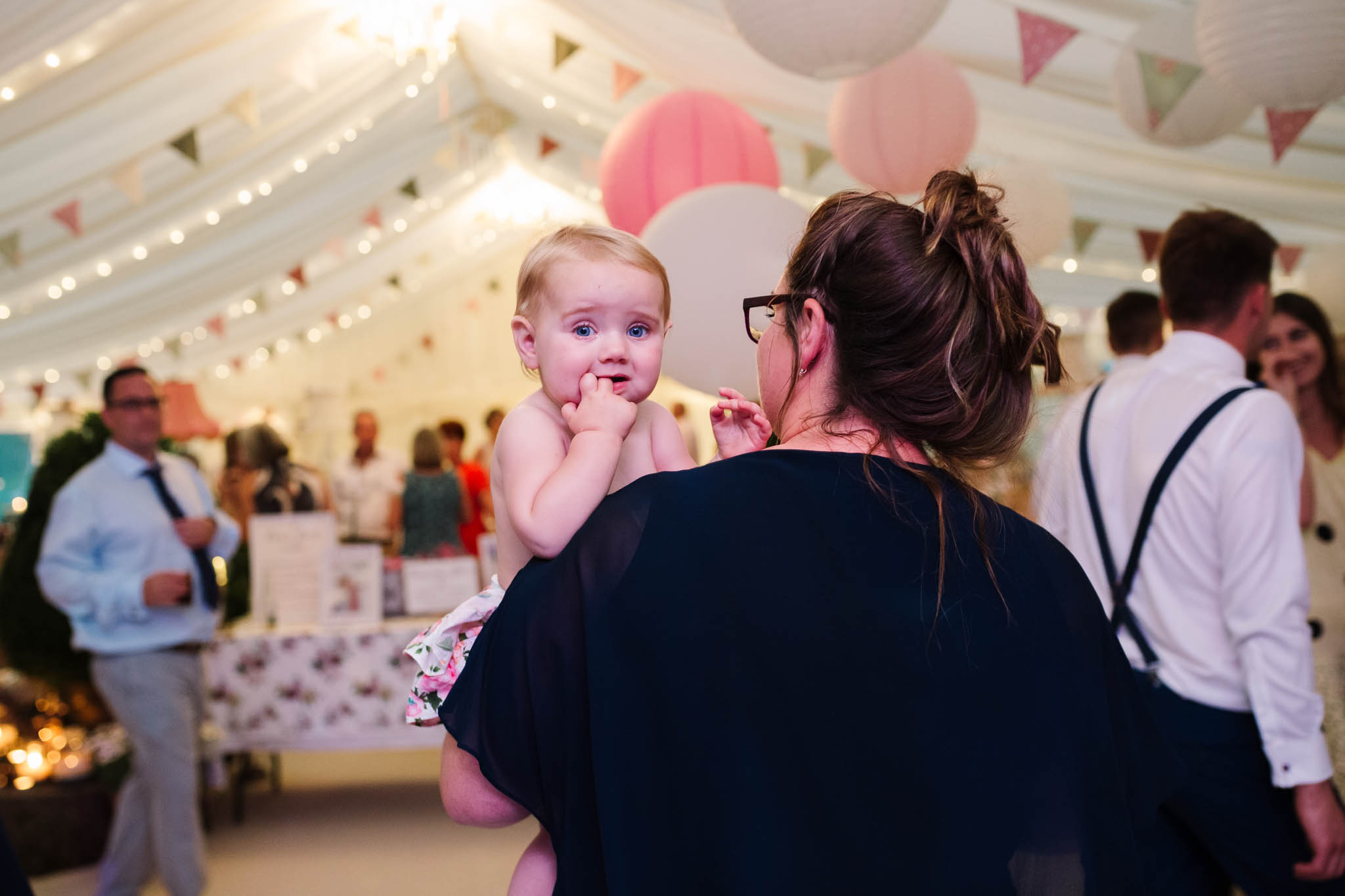 little girl on dance floor with mum