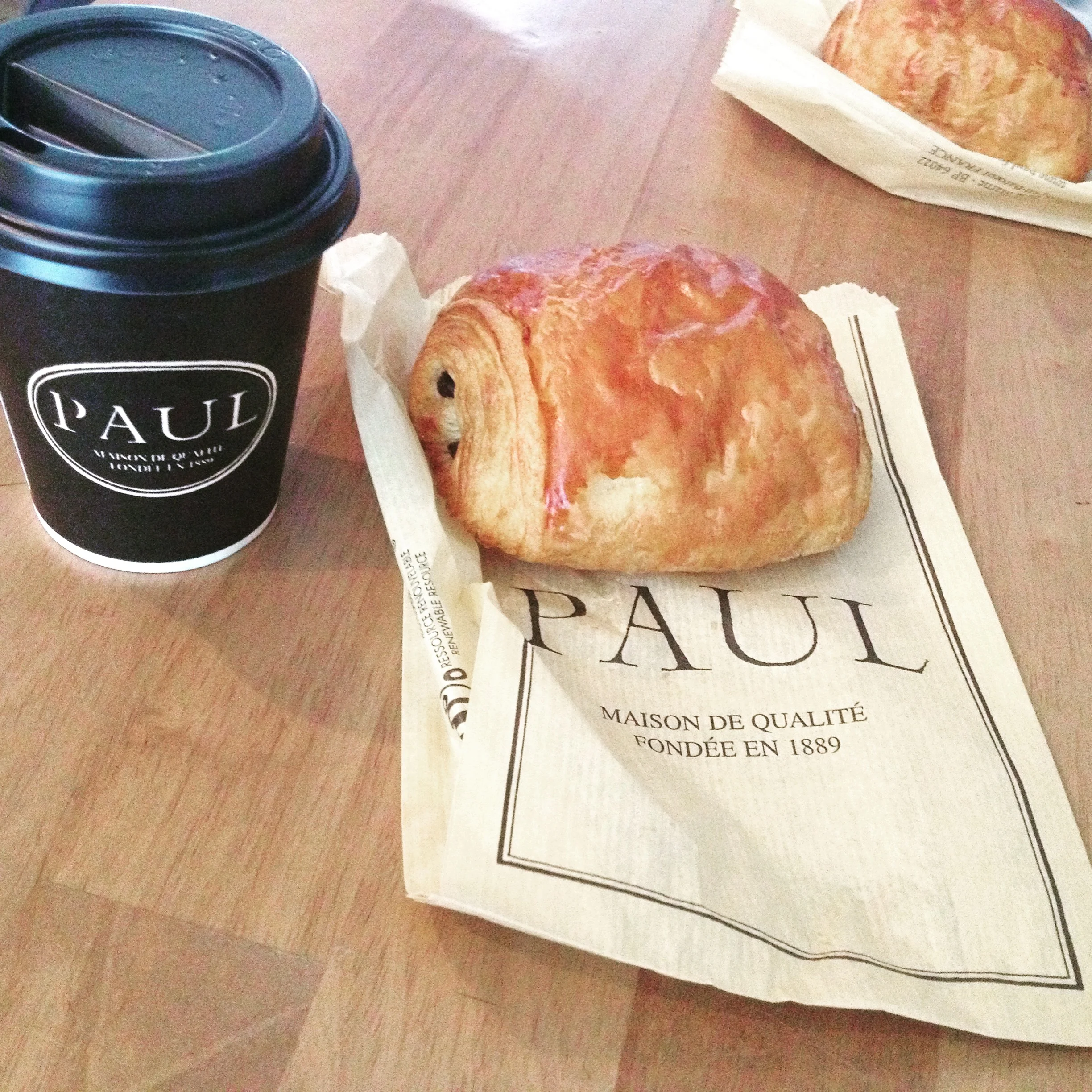 Pain au chocolate and coffee at Paul. 