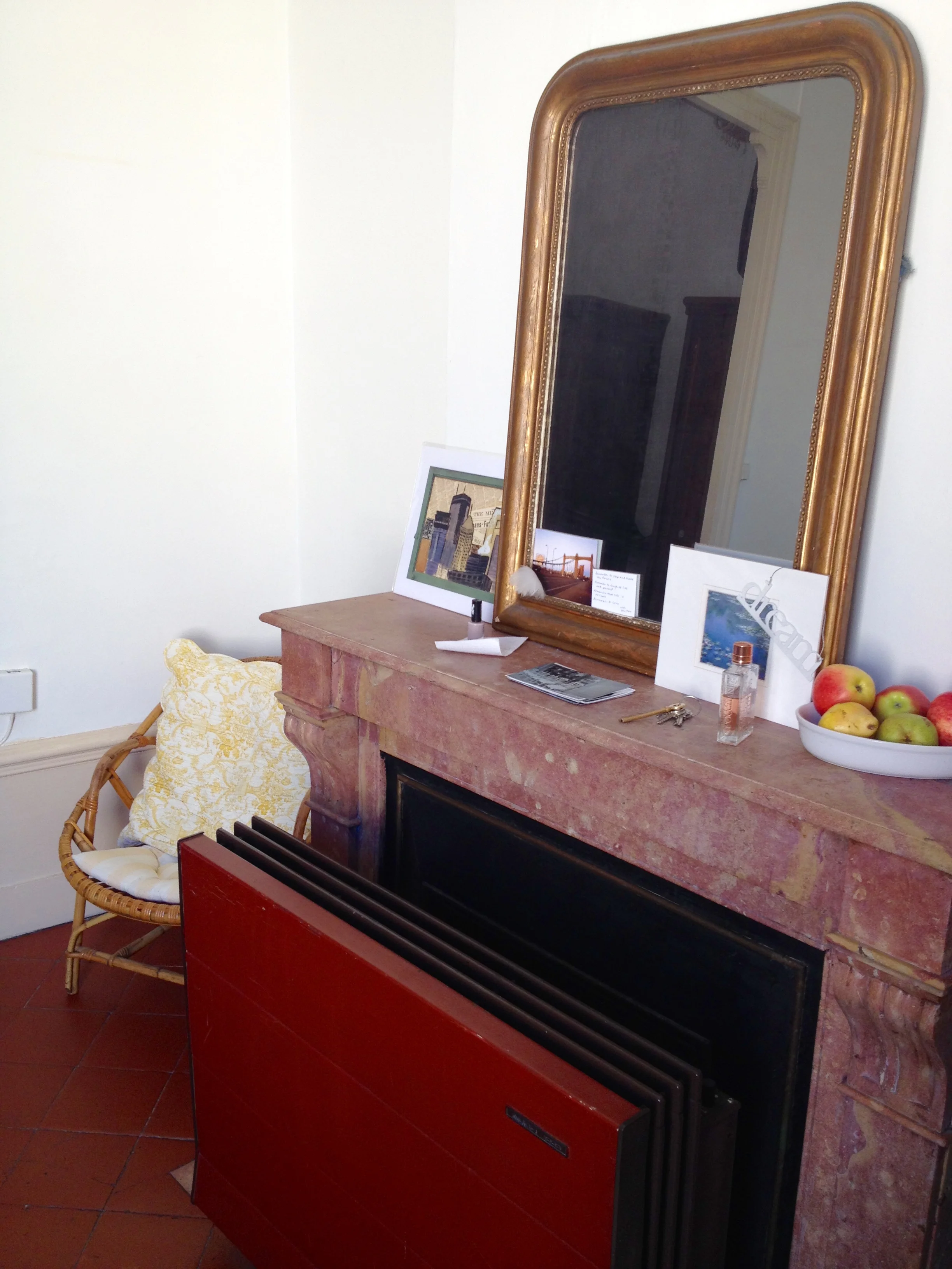 Fireplace + antique mirror = love at first sight.