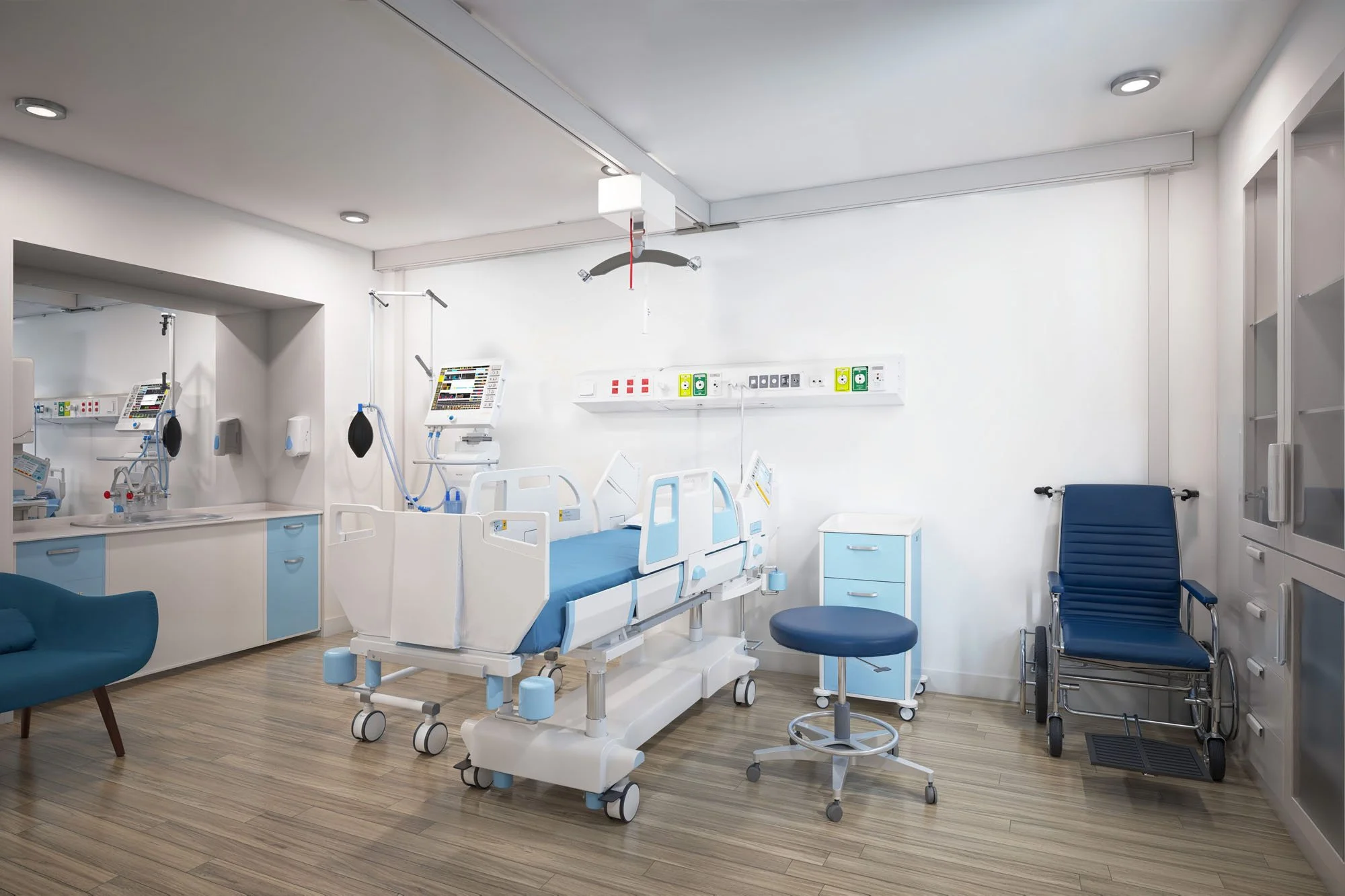 Hospital room with a bed, hospital equipment, and medical supplies.